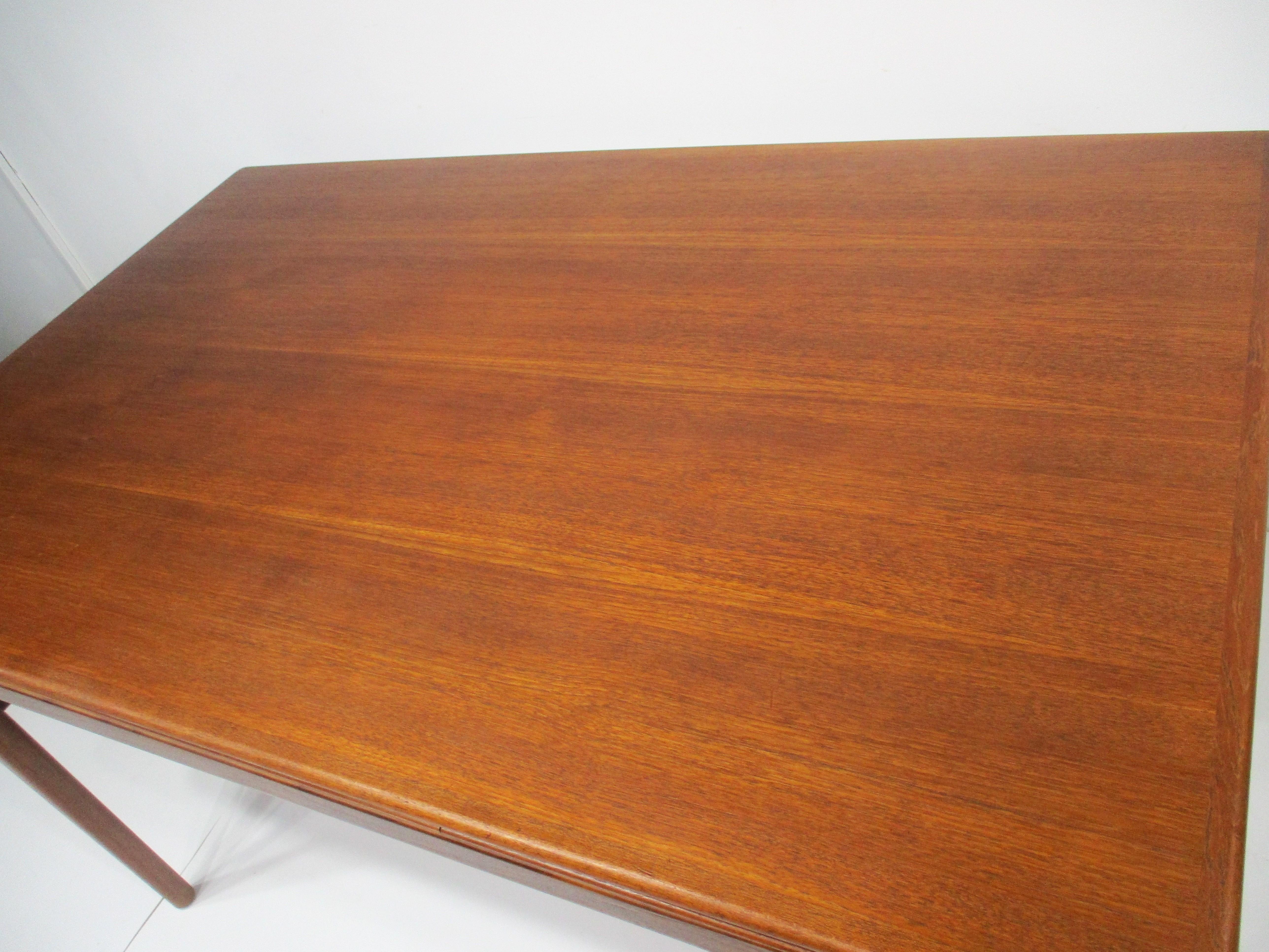 Mid-Century Modern Teak Dining Table w/ Pullout Expandable Leaves by Niels Moller Denmark  For Sale