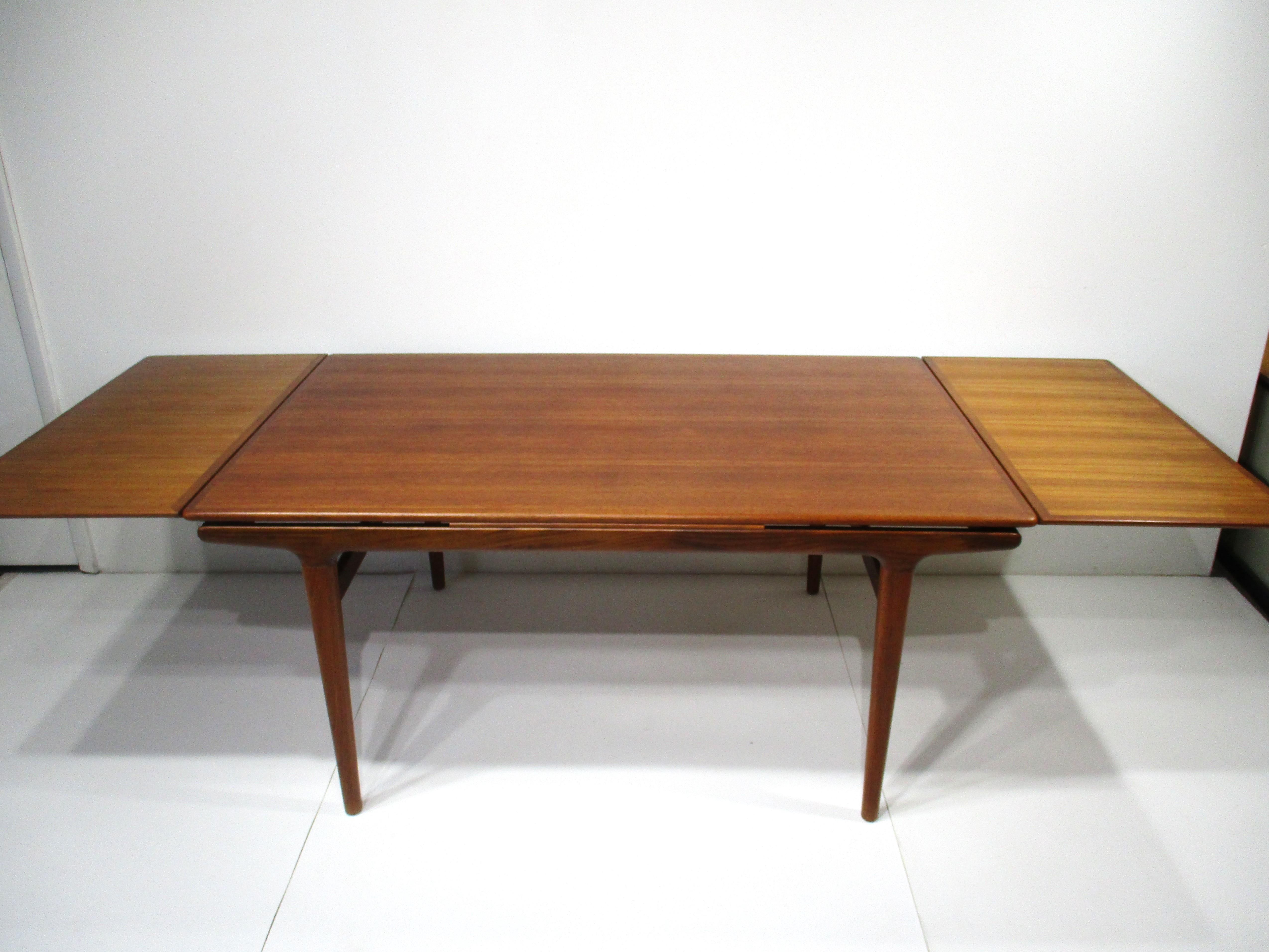 Teak Dining Table w/ Pullout Expandable Leaves by Niels Moller Denmark  For Sale 1