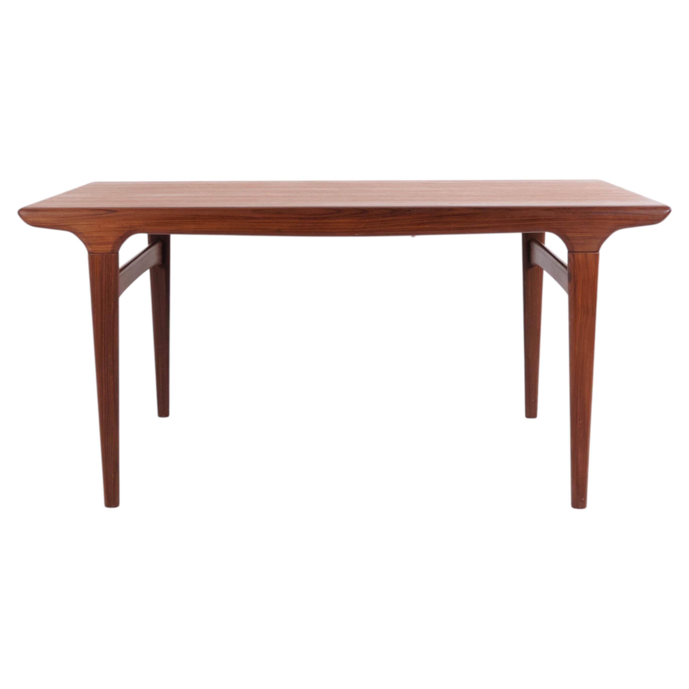 Teak dining table with extension by Johannes Andersen for Uldum Møbelfabrik from