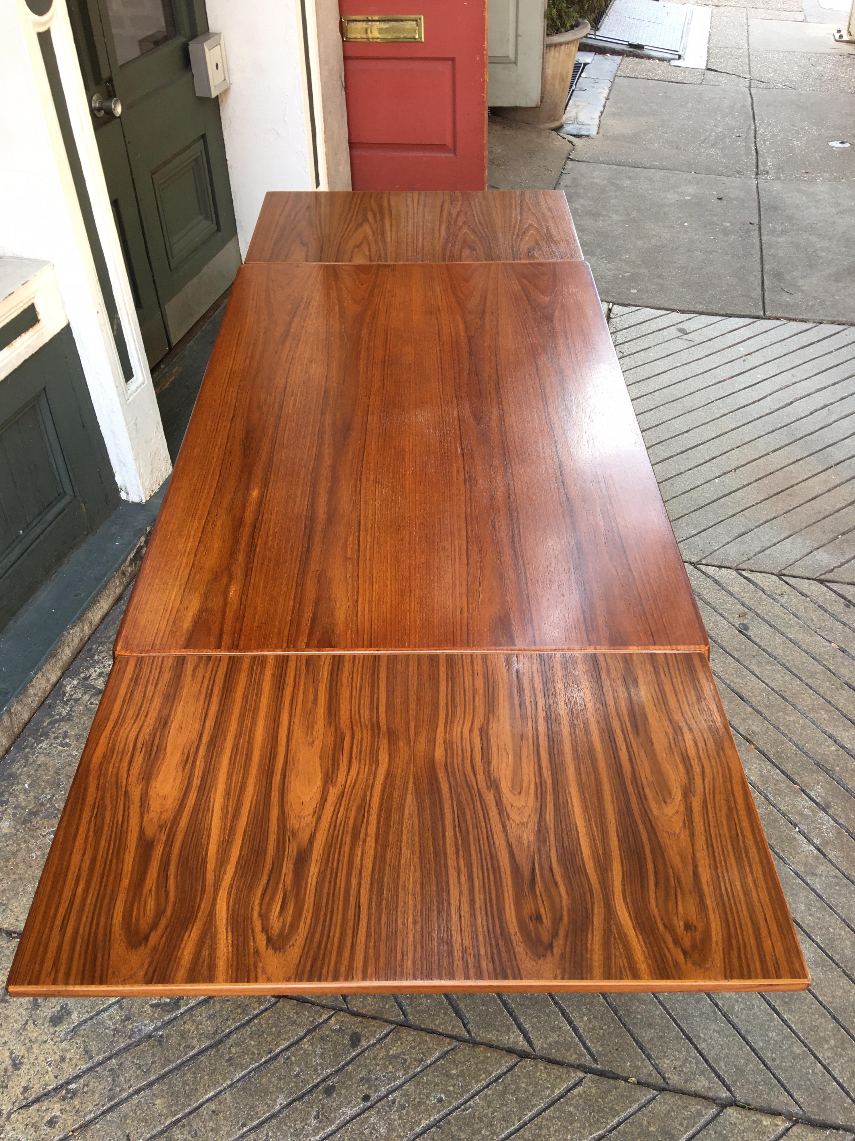 Mid-20th Century Teak Dining Table with Hidden Self Storing Leaves