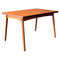 Teak Dining Table with Two Pull Out Leaves