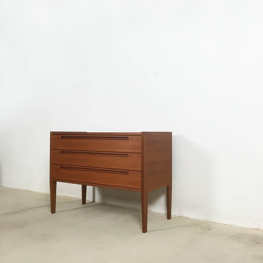 Drawers cabinet

Design: Nils Jonsson

Producer: Torring Möbelfabrik, Denmark

Decade: 1970s

This drawers cabinet was designed by Nils Jonsson for Torring Mobelfabrik in Denmark in the 1970s. It is made from teak and teak veneer and