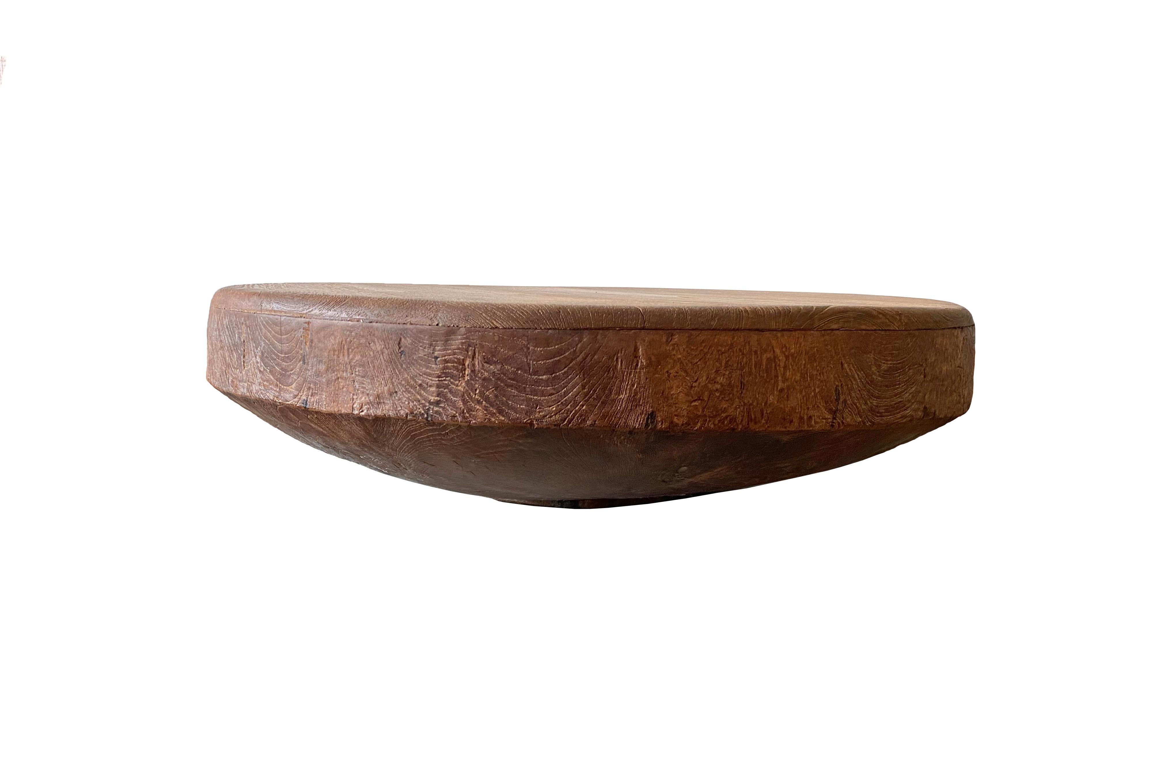 This teak drum was crafted on the island of Java, Indonesia. It is hollow in the centre but features a robust structure with beautiful wood patterning. Perfect to be used as a coffee table or sofa table. 

Dimensions: Height 21cm x Diameter 68.5cm.