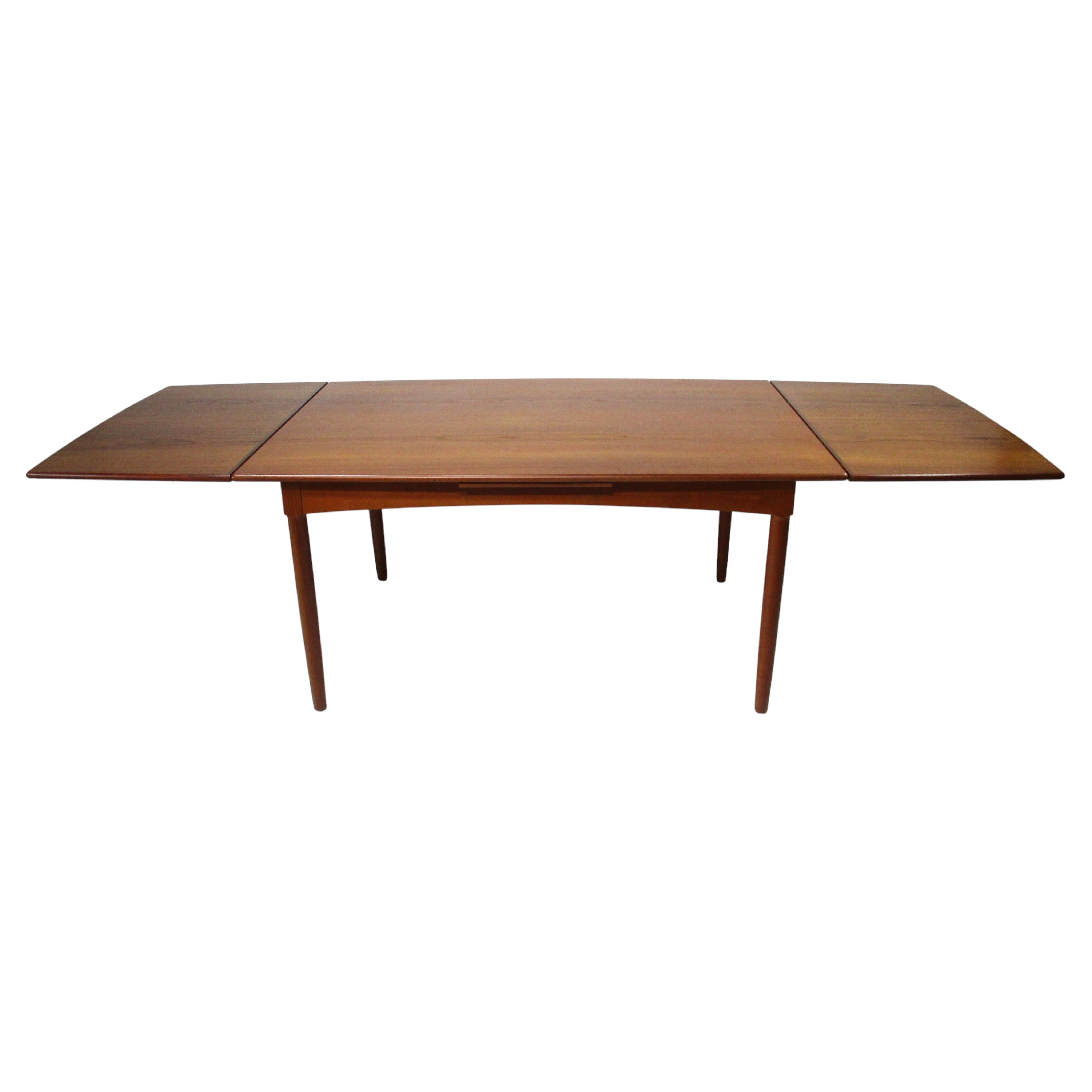 Teak Expandable Dining Table in the style of Niels Moller Denmark