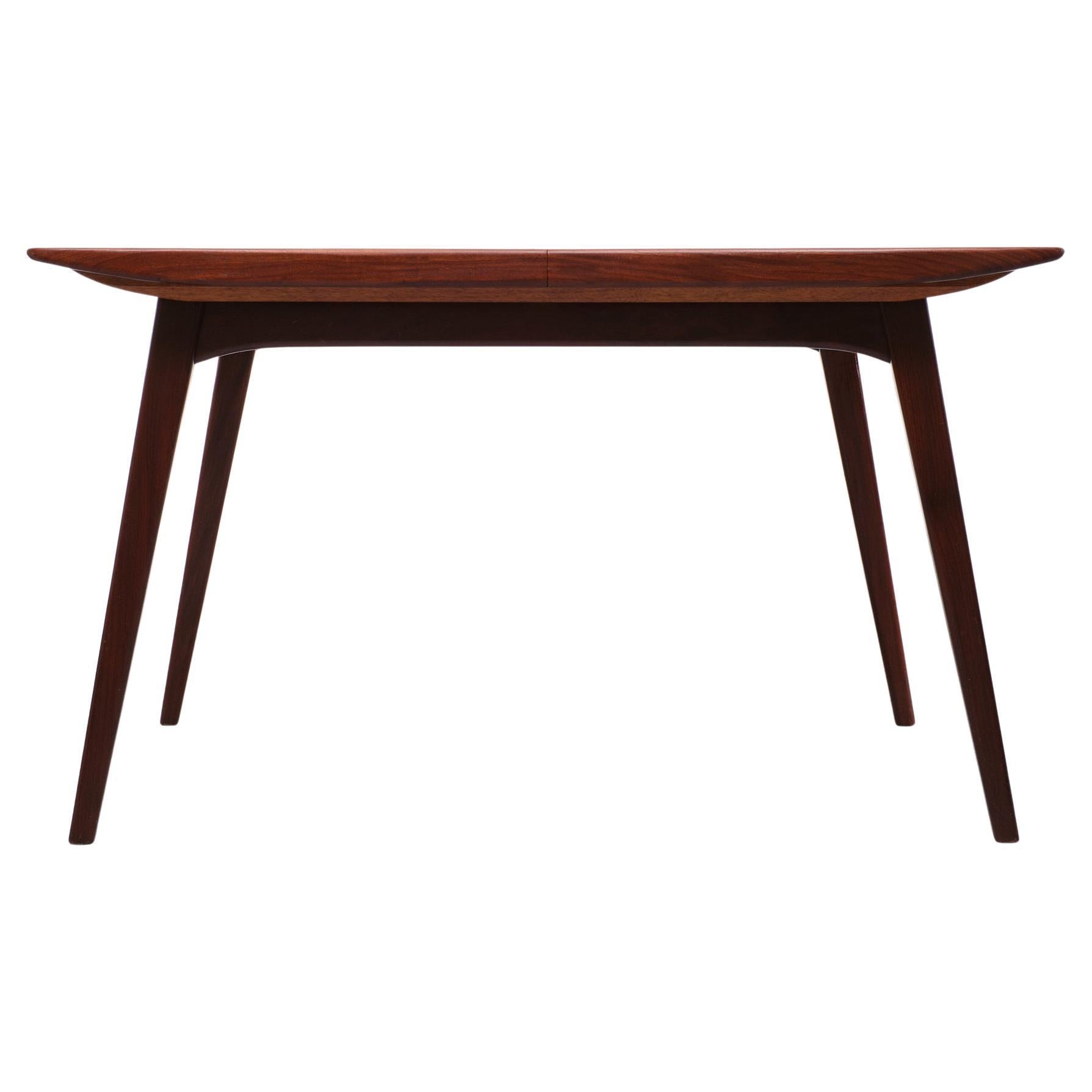 Very nice extendable dining table .Teak wood .Beautiful organic design .
from Louis van Teeffelen for Wébé  Dutch 1960s . The extra leaf 40 cm is hiding 
below the table . can be folding out when needed .  
           Width 130 cm extended  170 cm 