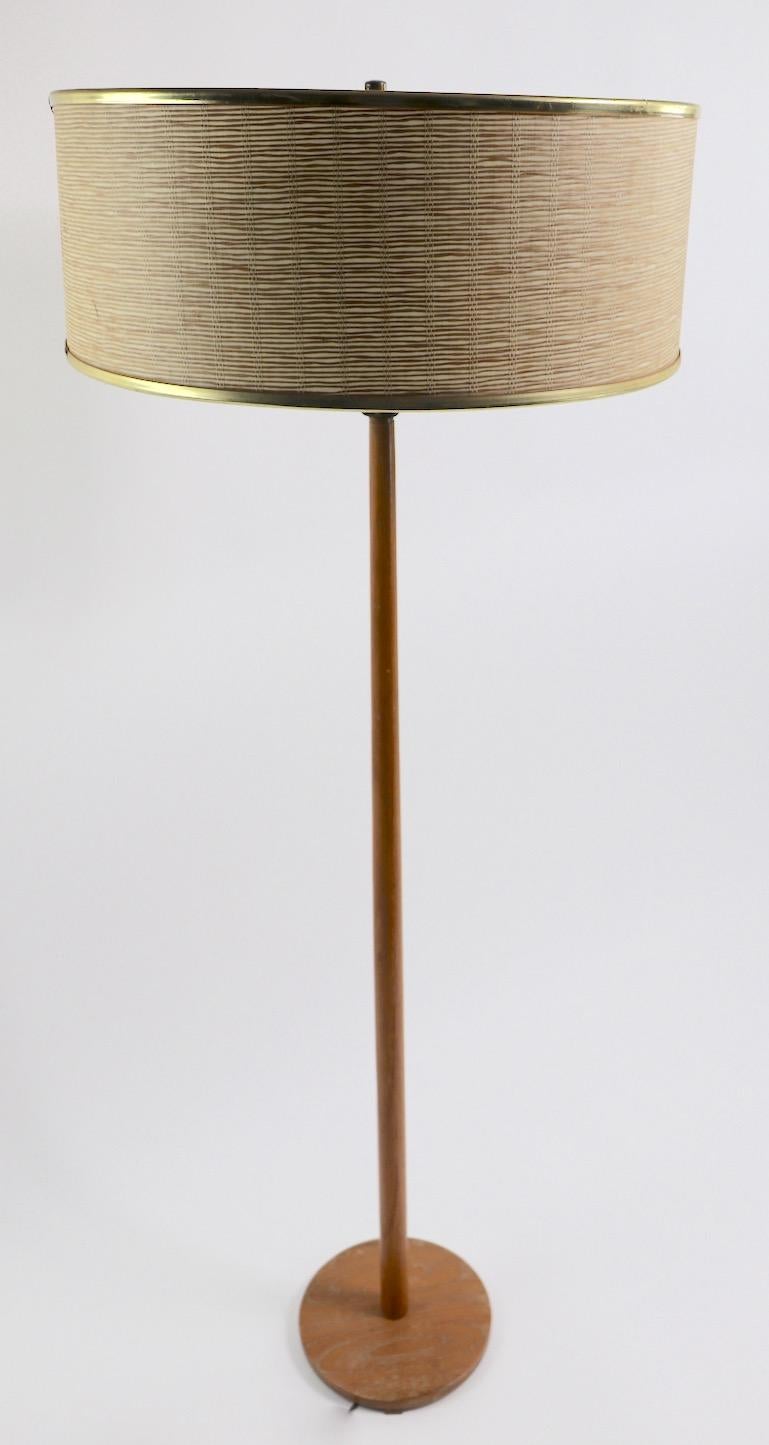 Midcentury teak floor lamp made in Sweden. Original clean and working condition, shade not included.