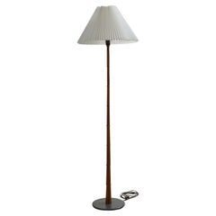 Teak floor lamp with a pleated lampshade, Denmark, 1950s