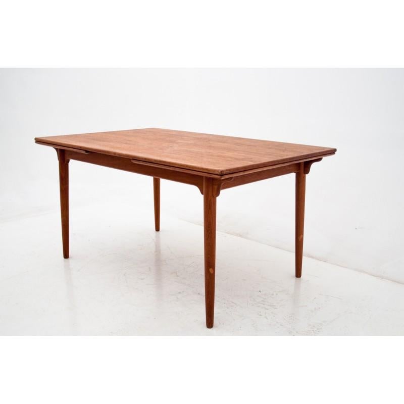 Teak table, Denmark, 1960s

Very good condition.
dimensions:

Measures: height 74.5 cm
length 170 cm / length when unfolded 242 cm.