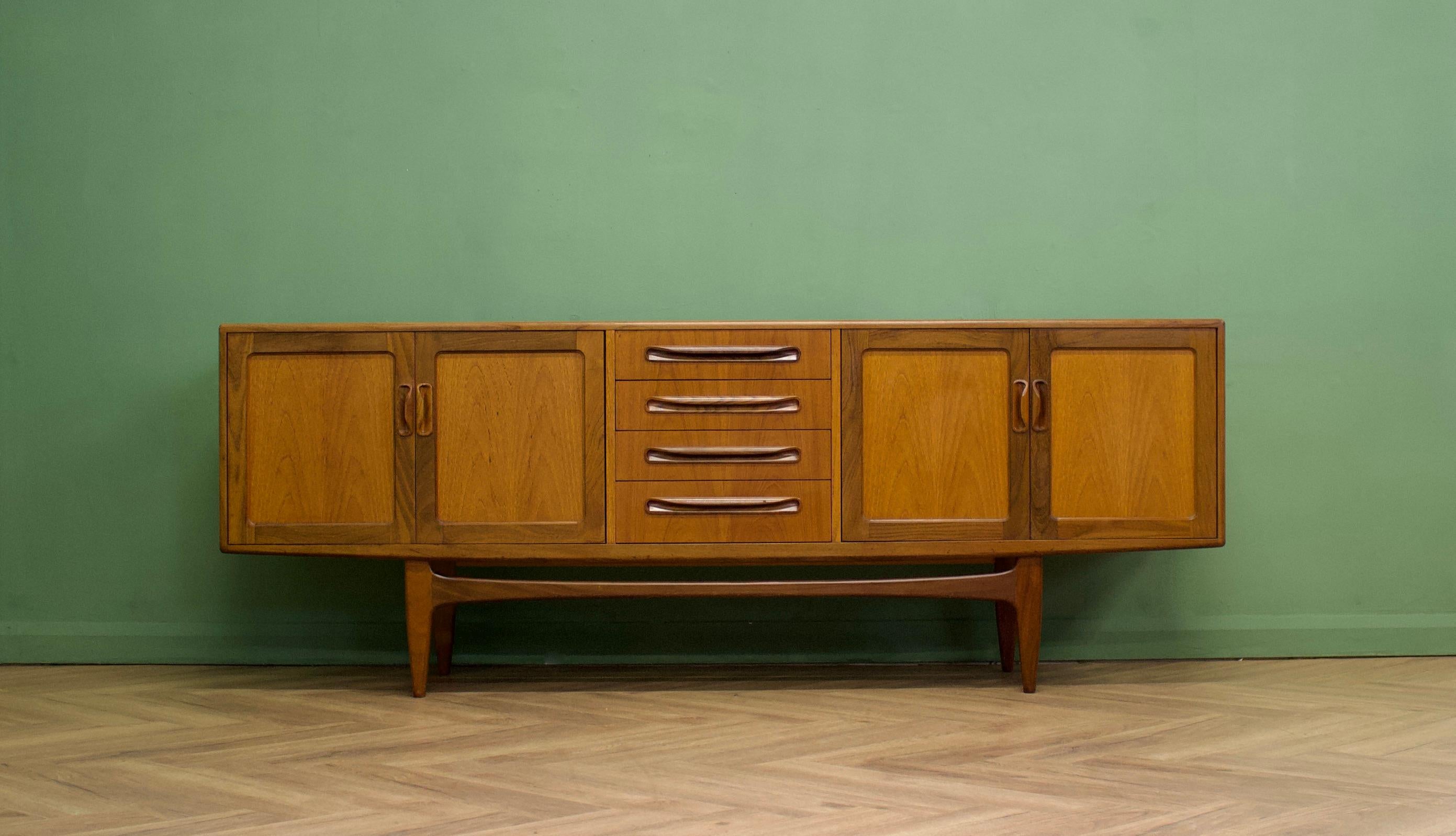 - A mid century Fresco teak sideboard from G Plan
- Featuring two cupboards with removable and adjustable selves - and four drawers