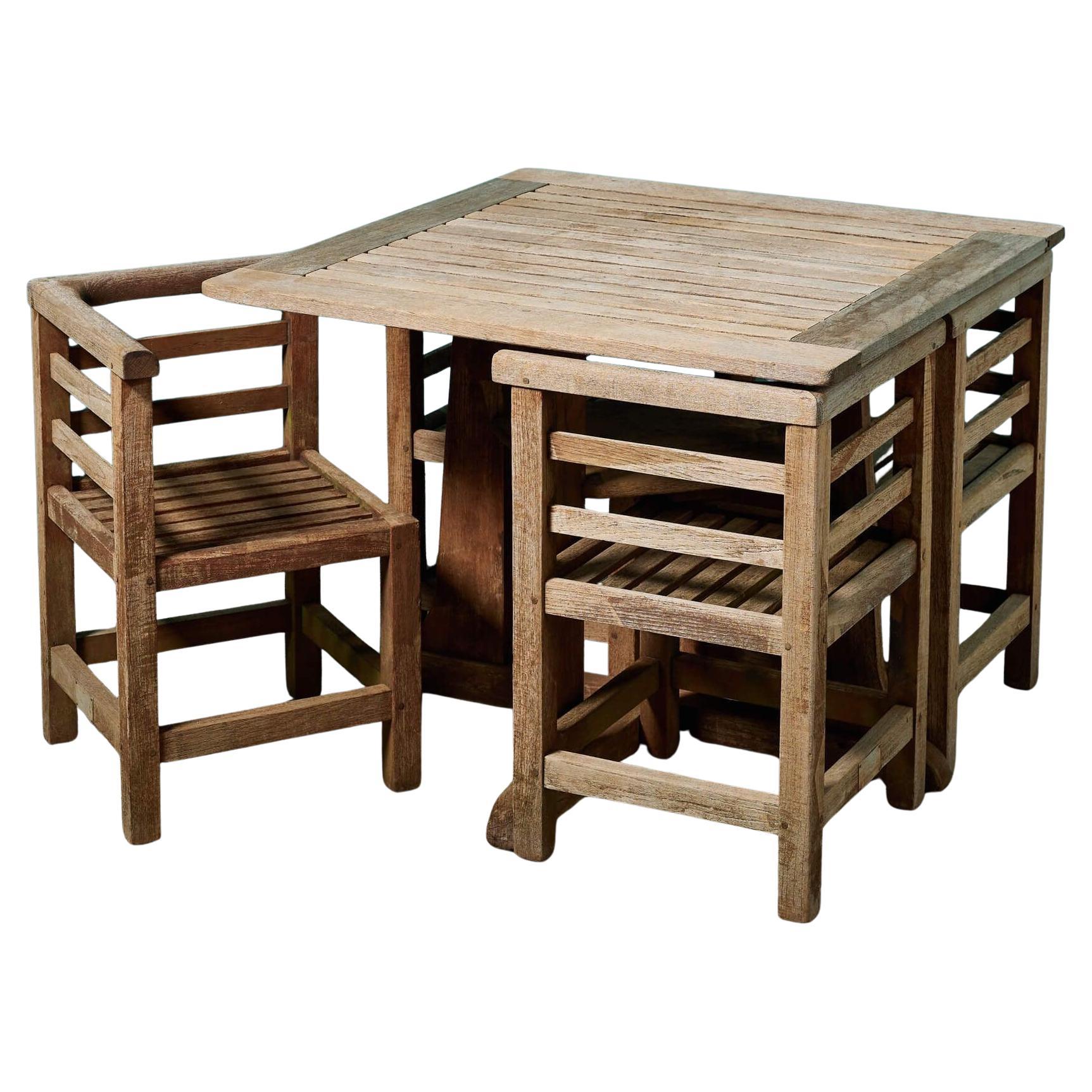 Teak Garden Shipbreaker Table 
Chairs Attributed to Heals For Sale