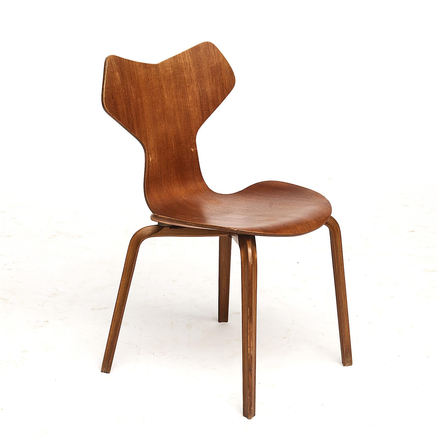 A set of six teak Grand Prix chairs designed by Arne Jacobsen. Manufactured by Fritz Hansen, Denmark, 1960s.
Each piece is in good original vintage condition and has some wear consistent with age and use.
Sold as a set of six.