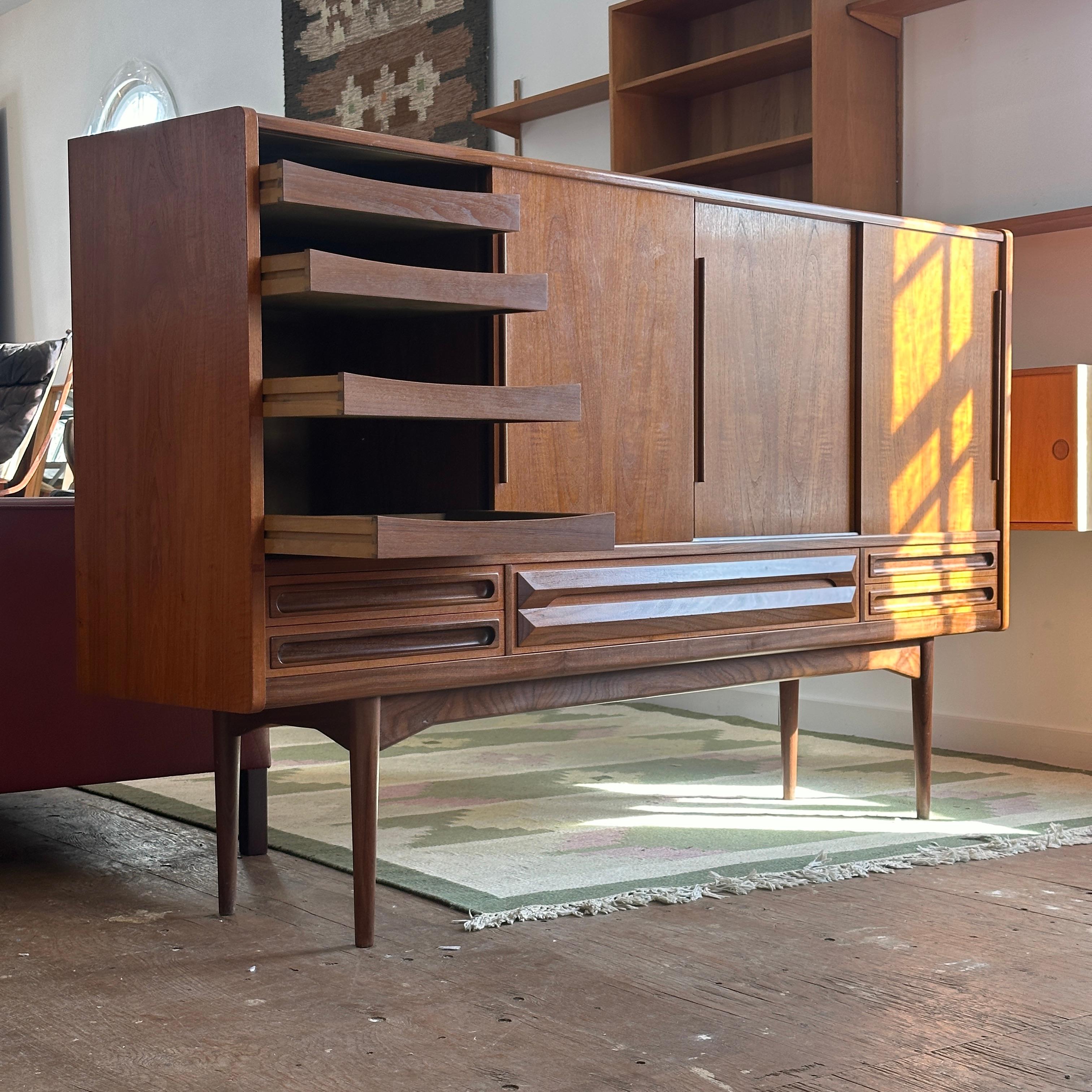 Condition: Great Vintage Condition

Dimensions: 78.75” L x 16.75” D x 47.5” H

Description: A vintage teak highboard by Johannes Andersen. Freshly imported from Denmark.

INV 2-33

Contact us for more details or pictures.