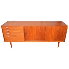Teak Kai Kristiansen Credenza with Graduated Drawers and His Iconic Smile Pulls