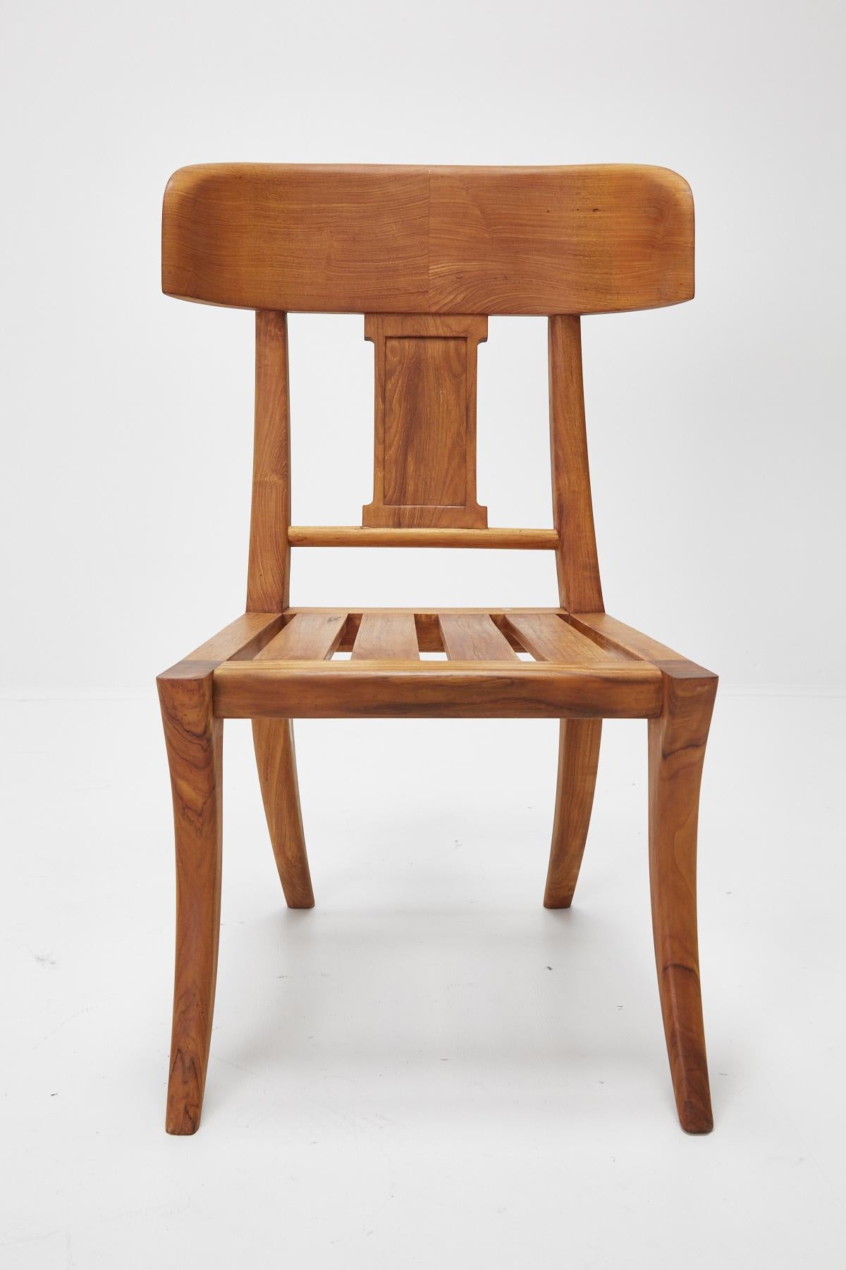 Beautiful solid teak side chair or dining chair with classical Klismos styling. Can be used inside or outside.