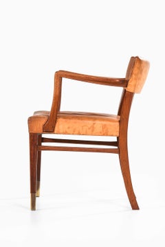 Fauteuil en teck, cuir et laiton, attribué à Ernst Kühn, années 1940