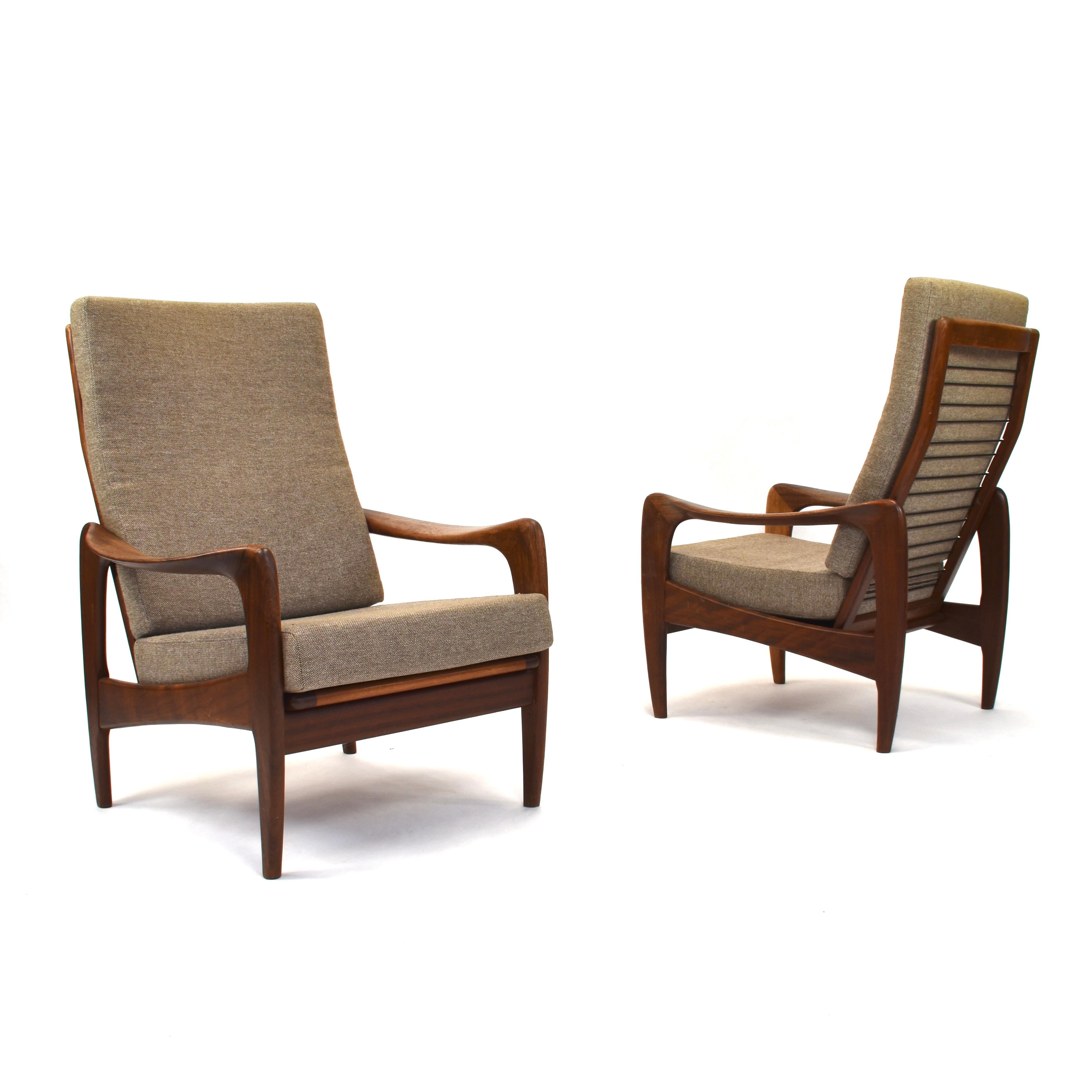 Pair of organic shaped solid teak lounge chairs by De Ster Gelderland.

Manufacturer: De Ster Gelderland
Designer: Unknown
Country: Netherlands
Model: Lounge armchair
Material: Solid teak / wool fabric 
Design period: 1960s
Date of