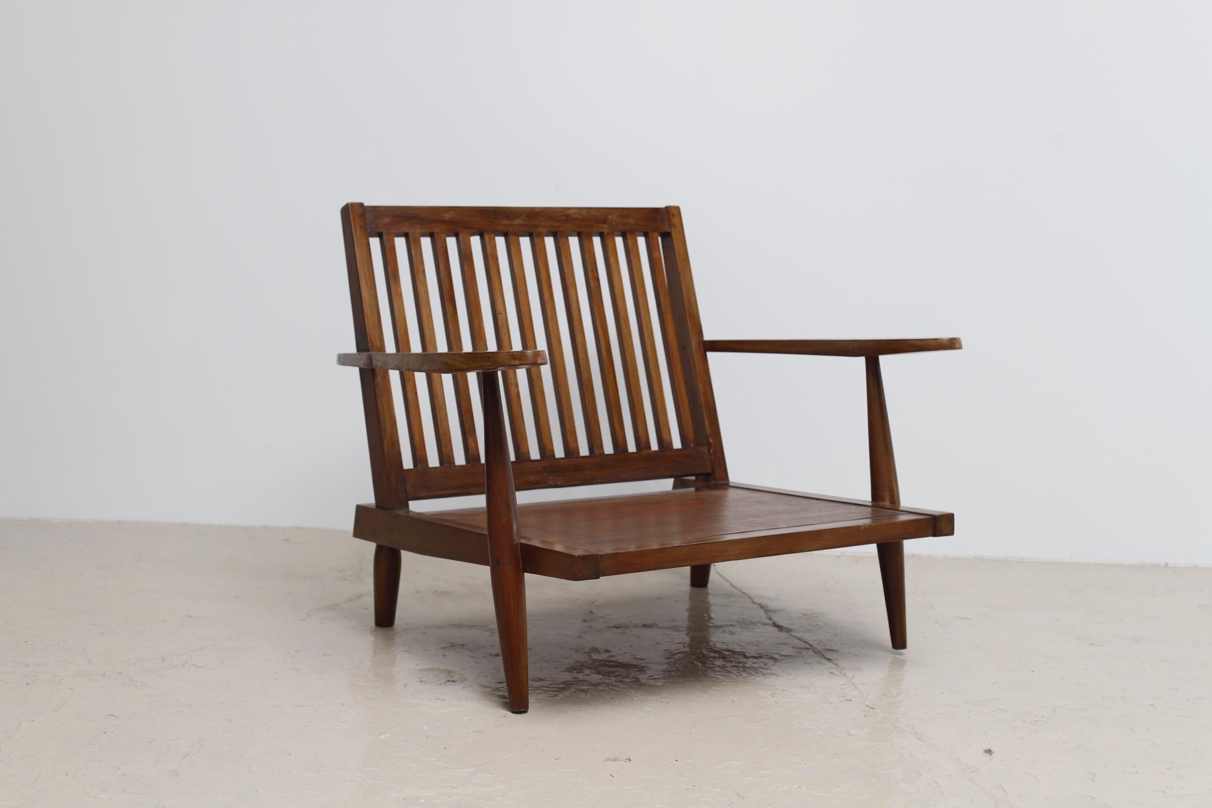 The type of wood is teak.
He visited the NID=National Institute of Design campus in India in 1964, he worked with local craftsmen to produce 32 designs and detailed drawings of furniture, including the chair.
Cushion is new one.