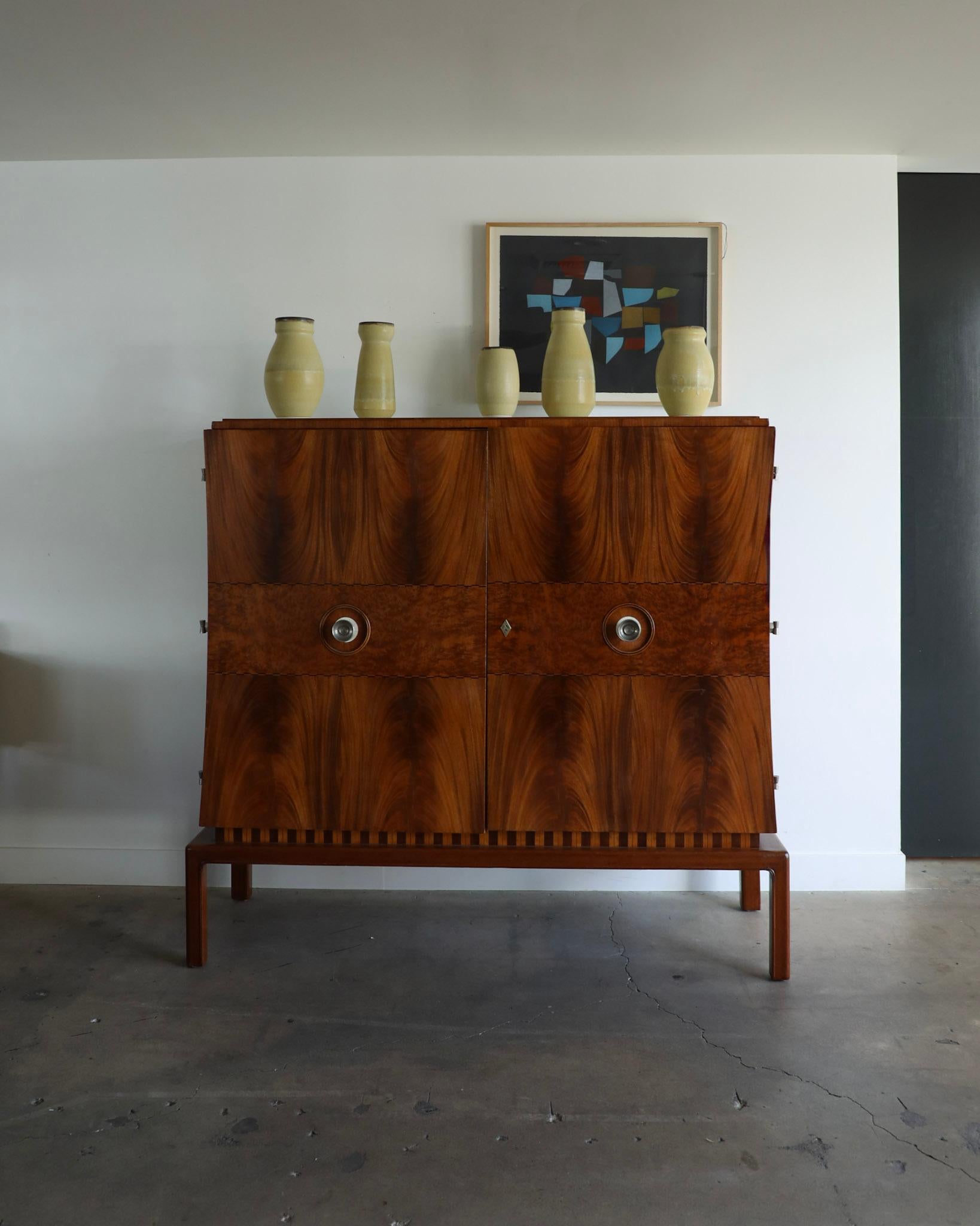 Teak & Mahogany Cabinet by Guglielmo Ulrich
Dimensions: 61