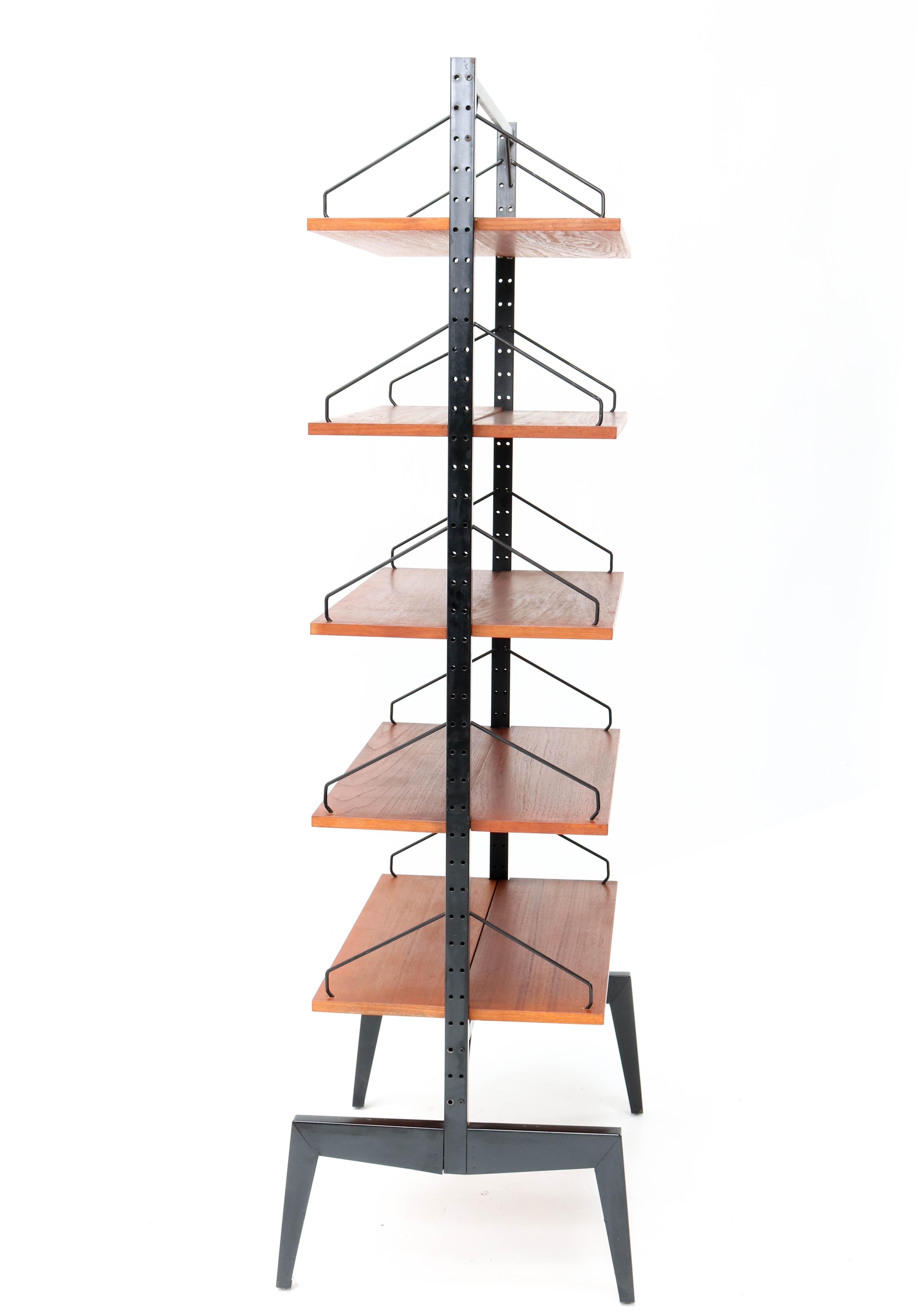 Stunning and rare Mid-Century Modern free standing Cado room divider.
Design by Poul Cadovius for Cado.
Striking Danish design from the 1960s.
Two original lacquered black metal uprights with ten original teak shelves.
Free standing room