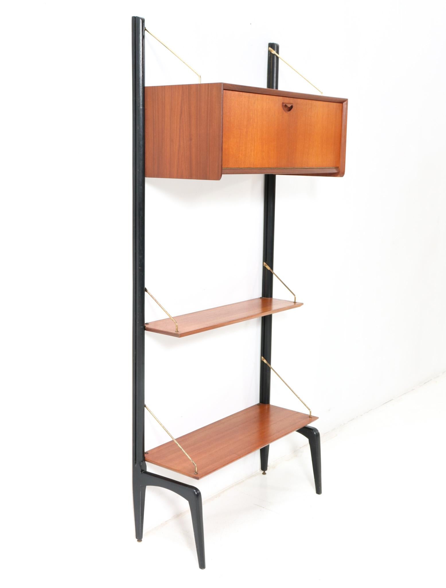 Magnificent and rare Mid-Century Modern free standing modular wall unit.
Design by Louis van Teeffelen for WéBé.
Striking Dutch design from the 1950s.
This wonderful Mid-Century Modern free standing wall unit by Louis van Teeffelen for WéBé is in