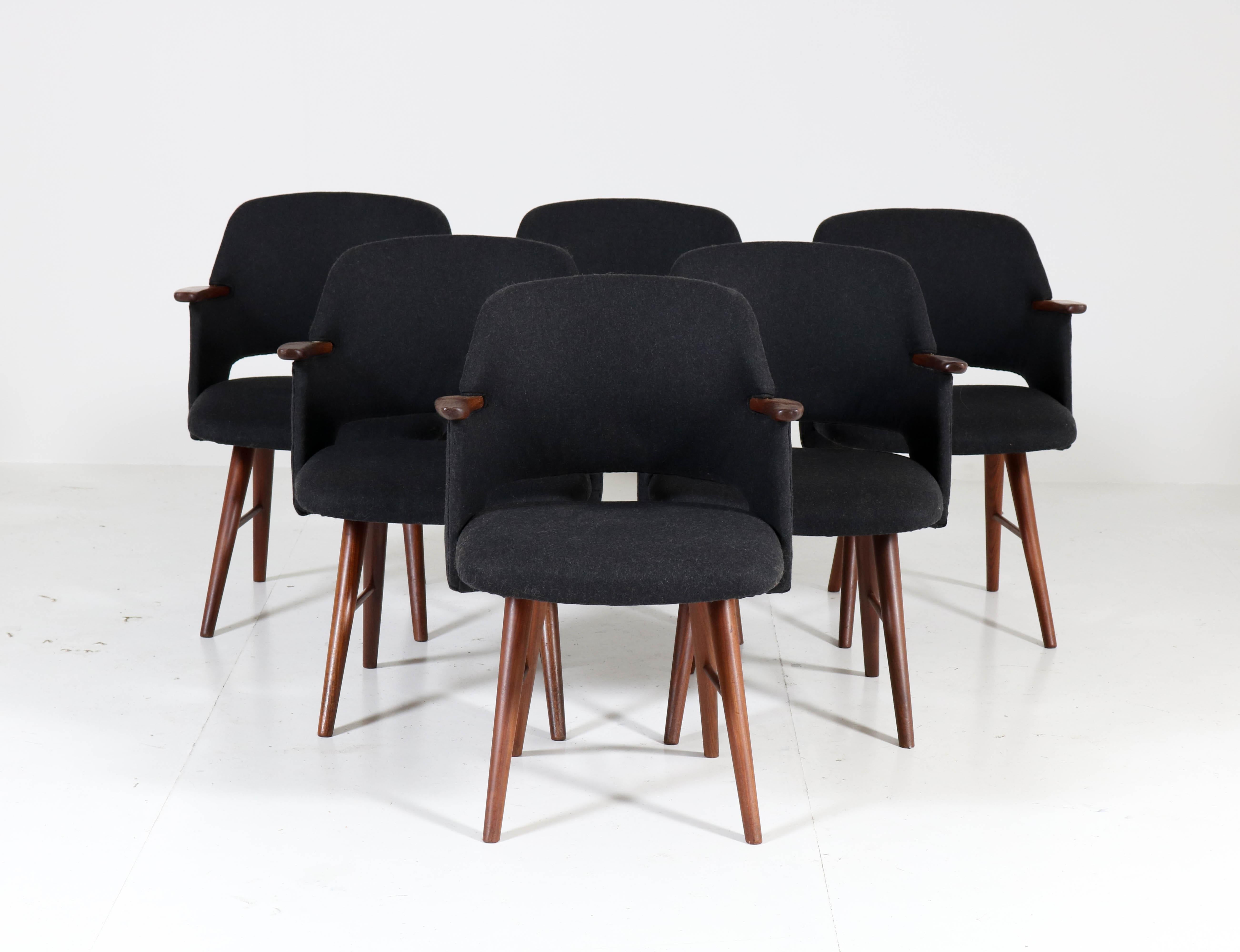 Wonderful and rare set of six Mid-Century Modern FT30 dining chairs.
Design by Cees Braakman for UMS Pastoe.
Striking Dutch design from the sixties.
Solid teak and re-upholstered with stylish Italian black velvet.
The chairs are marked with the