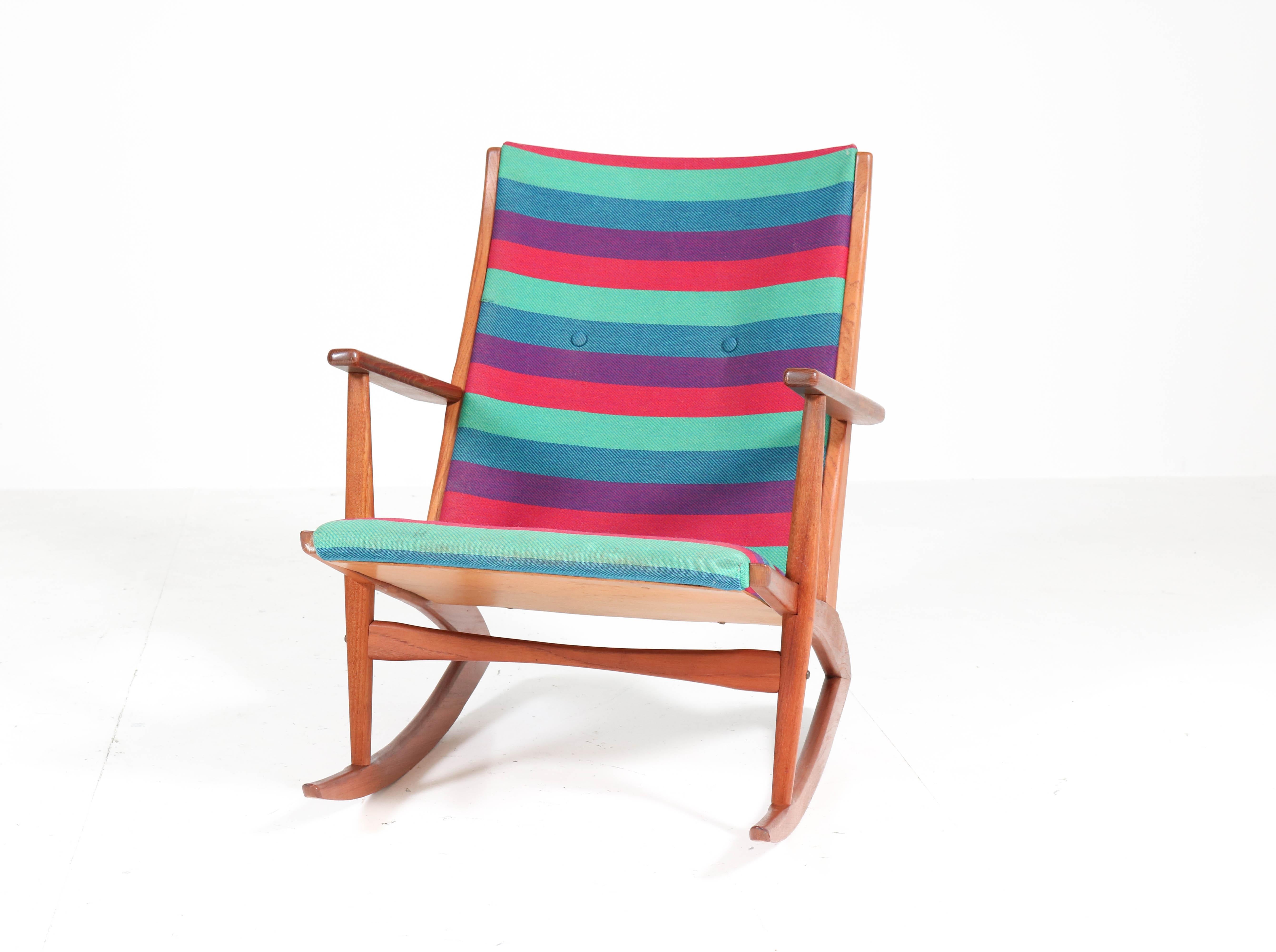 Wonderful Mid-Century Modern rocking chair.
Design by Holger George Jensen for Tønder Møbelværk.
Striking Danish design from the fifties.
Solid teak frame with original upholstery!
In very good condition with minor wear consistent with age and