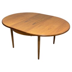 Teak Mid Century MODERN Round to Oval DINING TABLE, Made in Denmark, c. 1960’s