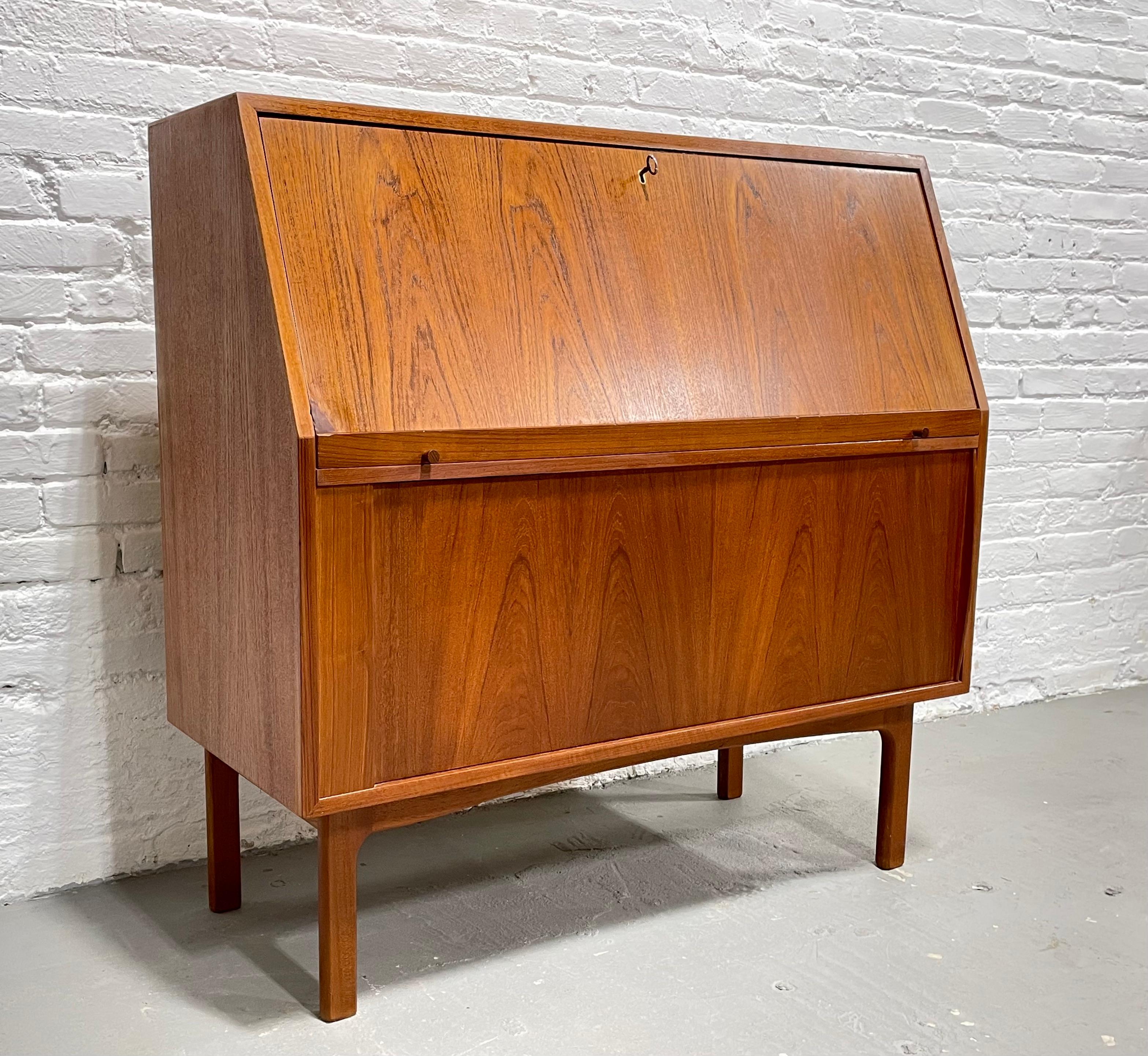 Vintage Mid-Century Modern Teak secretary desk + Tambour storage, Made in Denmark by BPS Bernhard Pedersen, c. 1960s. This piece boasts tons of delicious design details: upper area has a drop down desk with storage cubbies and drawers, perfect for