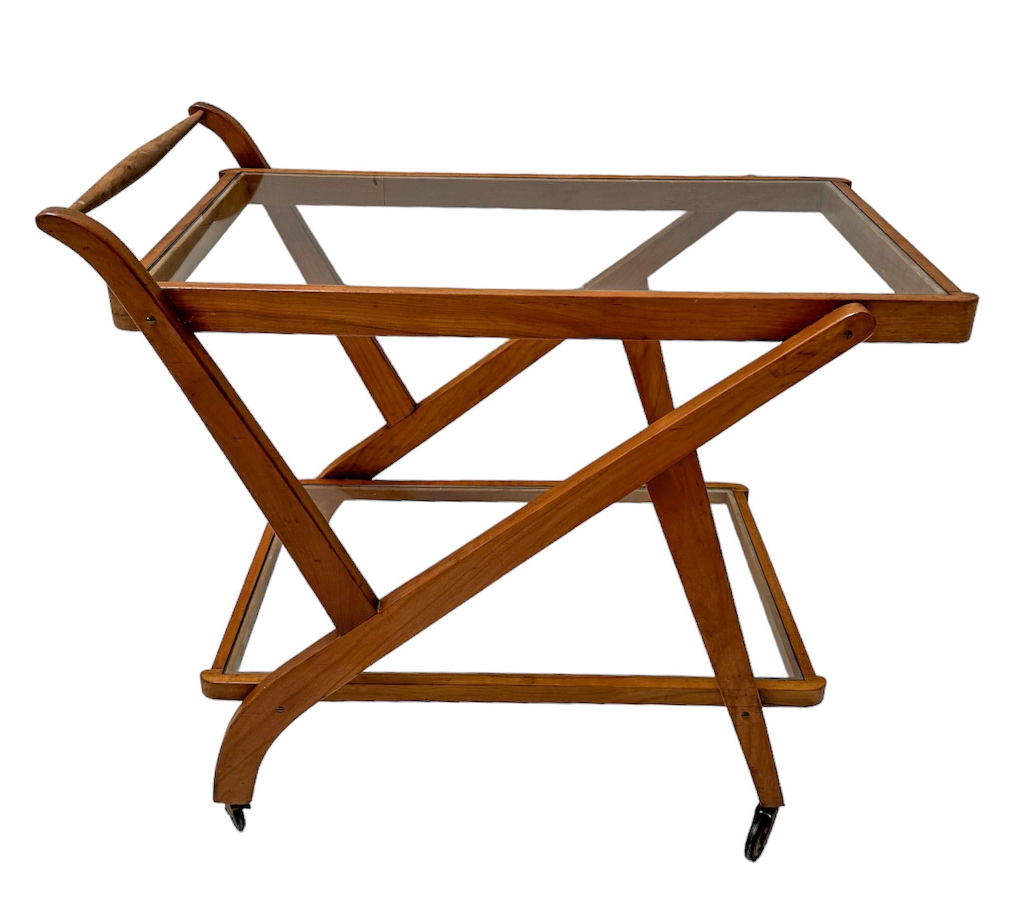 Stunning and elegant Mid-Century Modern serving trolley or cart.
Striking Dutch design from the 1960s.
Solid teak frame with two original glass tops.
Four original wheels and all four are in good working order.
This wonderful Mid-Century Modern