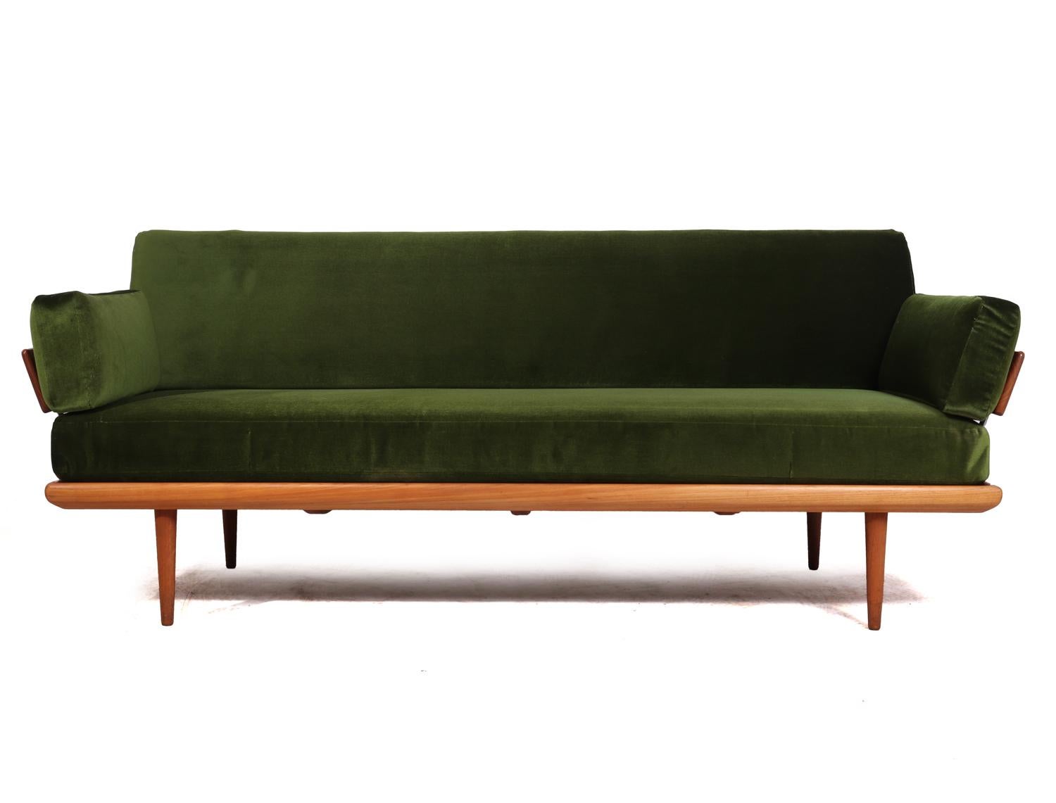 Teak minerva daybed by Peter Hvidt for France and Son
Designed by Peter Hvidt and Orla Molgaard in 1957 and produced in Denmark by France and Son in teak and chromed steel the seat back and arms are the original sprung cushions re upholstered to a