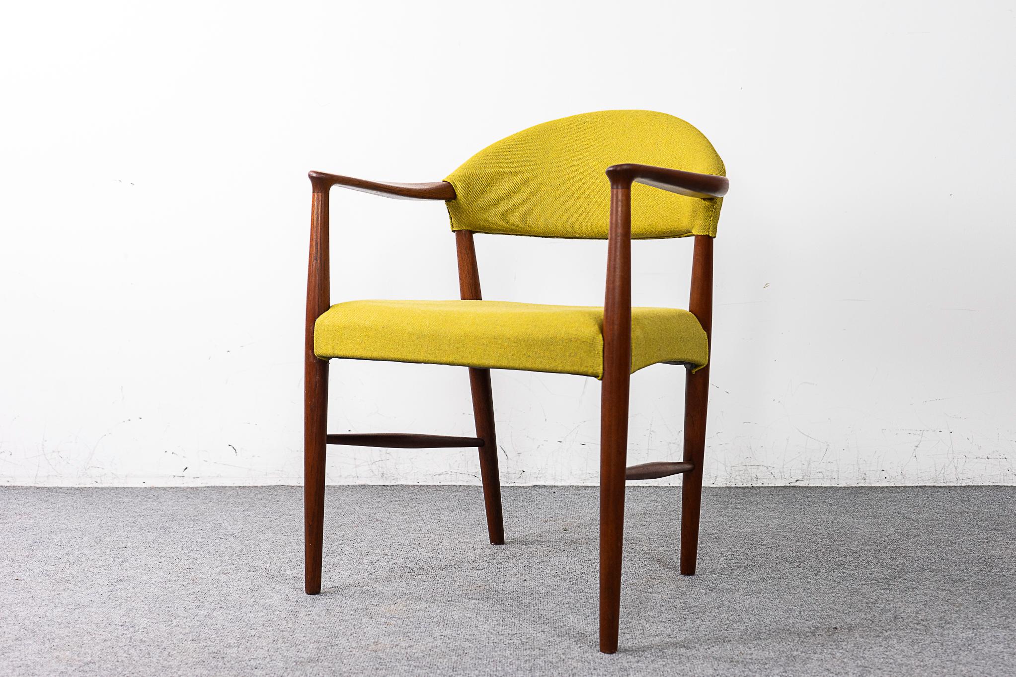 Teak Model 223 Danish arm chair by Kurt Olsen, circa 1960's. Sculptural solid wood frame with elegant details. Splayed tapering legs with spindle cross bars. Lovely lemon/lime upholstery in a blend of 70% pure new wool and 30% flax.