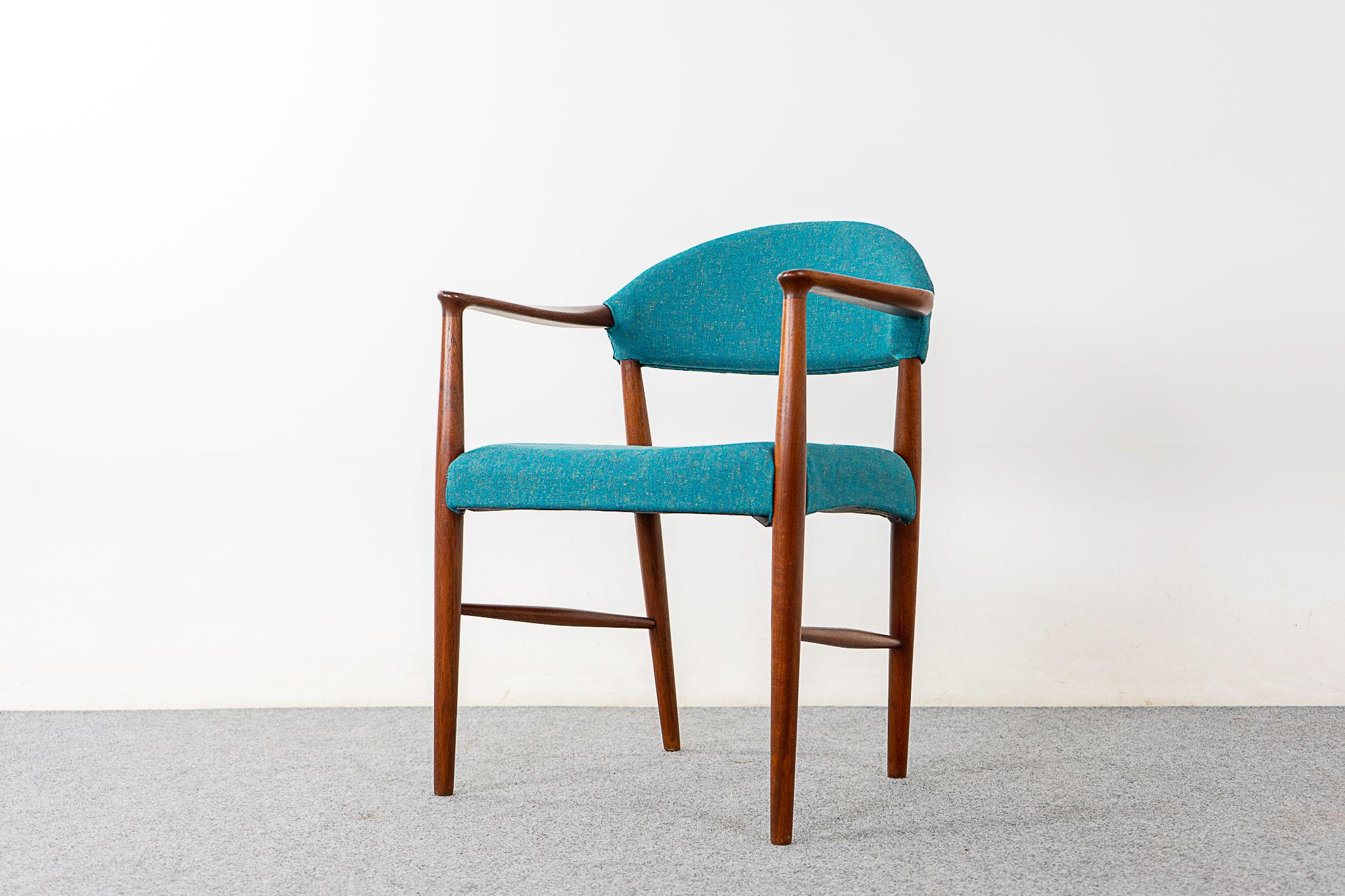 Teak Model 223 Danish arm chair by Kurt Olsen, circa 1960's. Sculptural solid wood frame with elegant details. Splayed tapering legs with spindle cross bars. Lovely teal upholstery in a blend of 70% pure new wool and 30% flax.