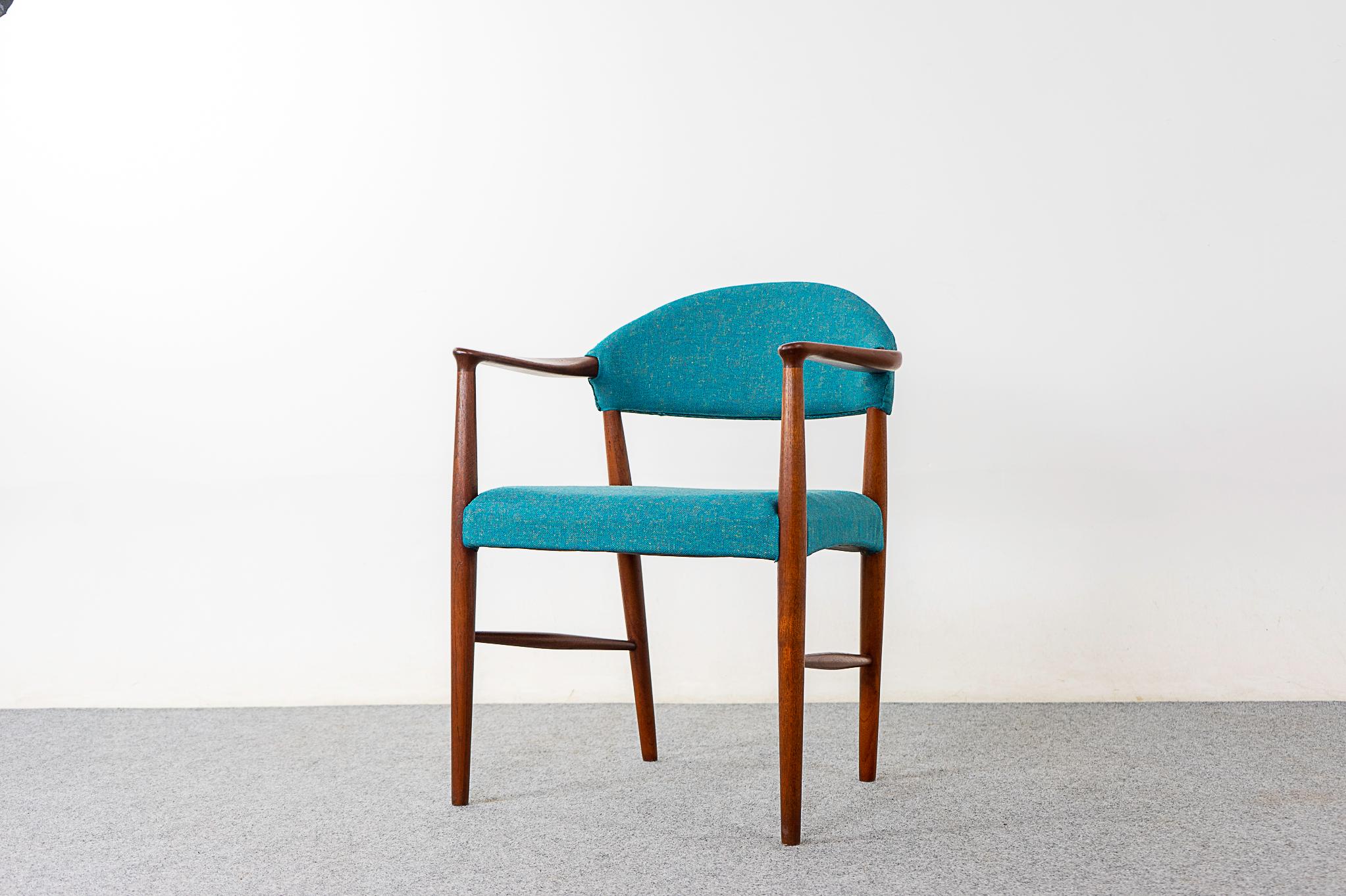 Teak Model 223 Danish arm chair by Kurt Olsen, circa 1960's. Sculptural solid wood frame with elegant details. Splayed tapering legs with spindle cross bars. Lovely teal upholstery in a blend of 70% pure new wool and 30% flax.

Please inquire for