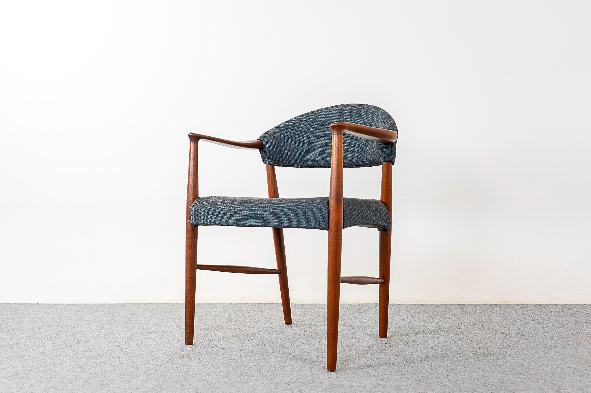 Teak Model 223 Danish arm chair by Kurt Olsen, circa 1960's. Sculptural solid wood frame with elegant details. Splayed tapering legs with spindle cross bars. Lovely grey wool upholstery.

Please inquire for remote and international shipping.