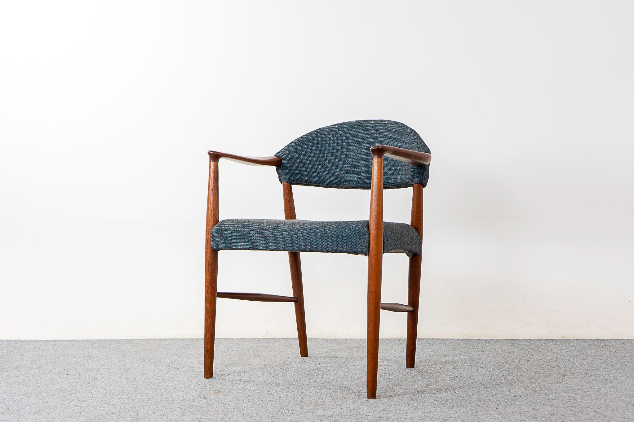 Teak Model 223 Danish arm chair by Kurt Olsen, circa 1960's. Sculptural solid wood frame with elegant details. Splayed tapering legs with spindle cross bars. Lovely grey wool upholstery.

Please inquire for remote and international shipping.