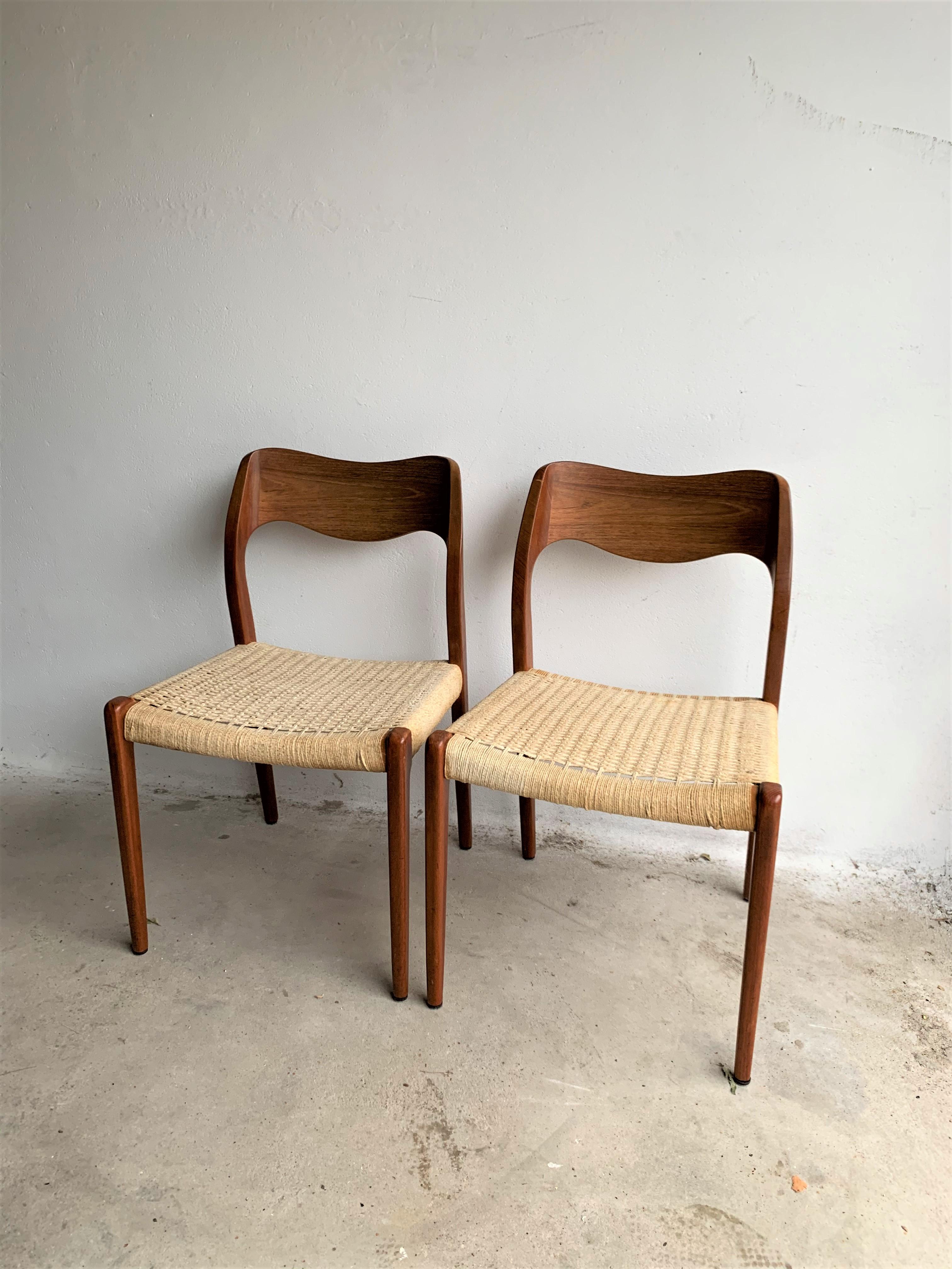 Mid-Century Modern dining chairs by Niels O. Møller for J.L. Møller Møbelfabrik in teak model no. 71, Denmark. Classic icon of Mid-Century Modern. Great quality teak frame, paper cord in good original vintage condition.