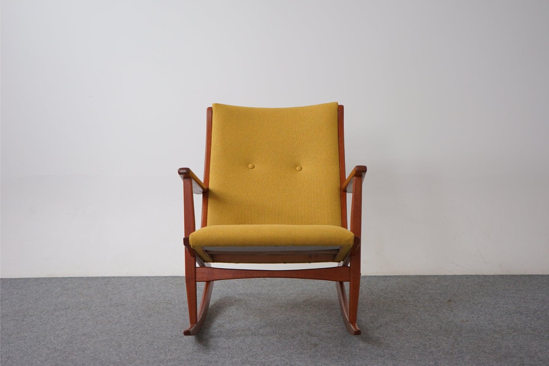 Solid teak, Danish modern rocking chair by Holger Georg Jensen for Kubus circa 1958. Model 97, this iconic chair has a stunning boomerang profile. Wood frame has been fully restored and upholstery has been re-done with new wool/flax vibrant yellow