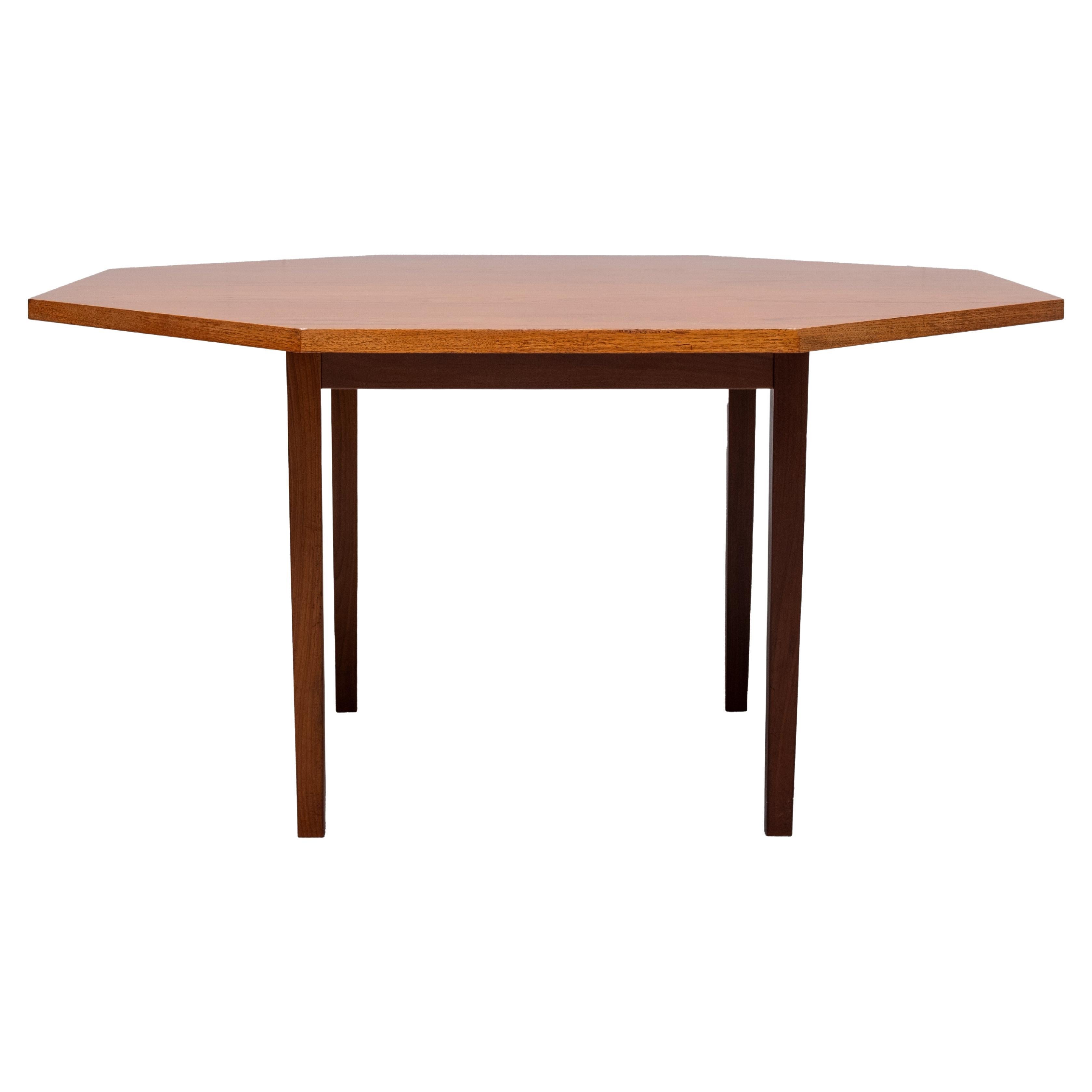 Very nice octangle shaped dining table . Solid Teak Wood legs .
1960s . the legs are detachable . Good condition.  