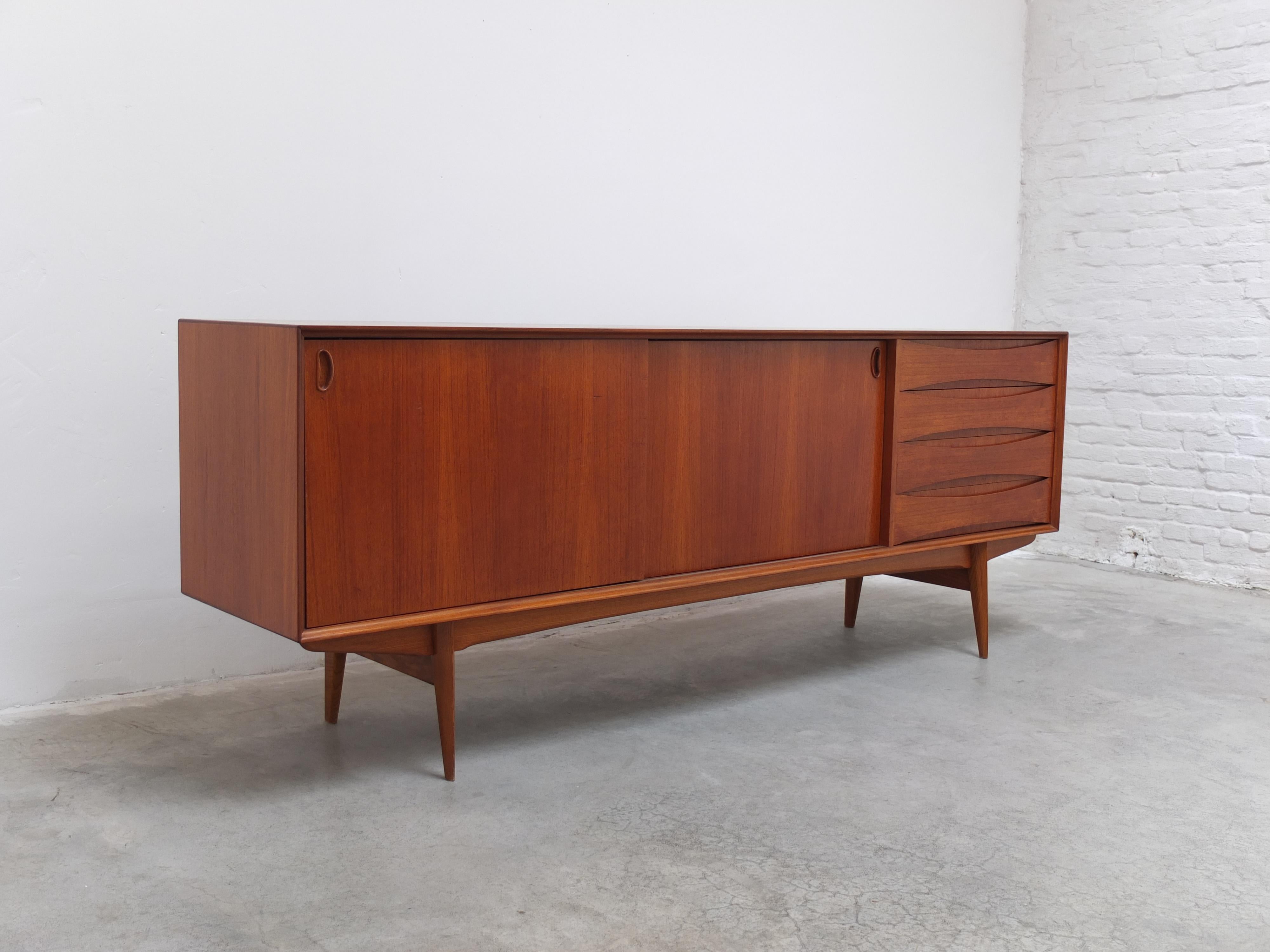 Beautiful model 'Paola' sideboard designed by Oswald Vermaercke for V-Form in 1959. It was named after the Belgian queen Paola who married Albert II the King of Belgium in the same year. This model was produced in different sizes and this particular