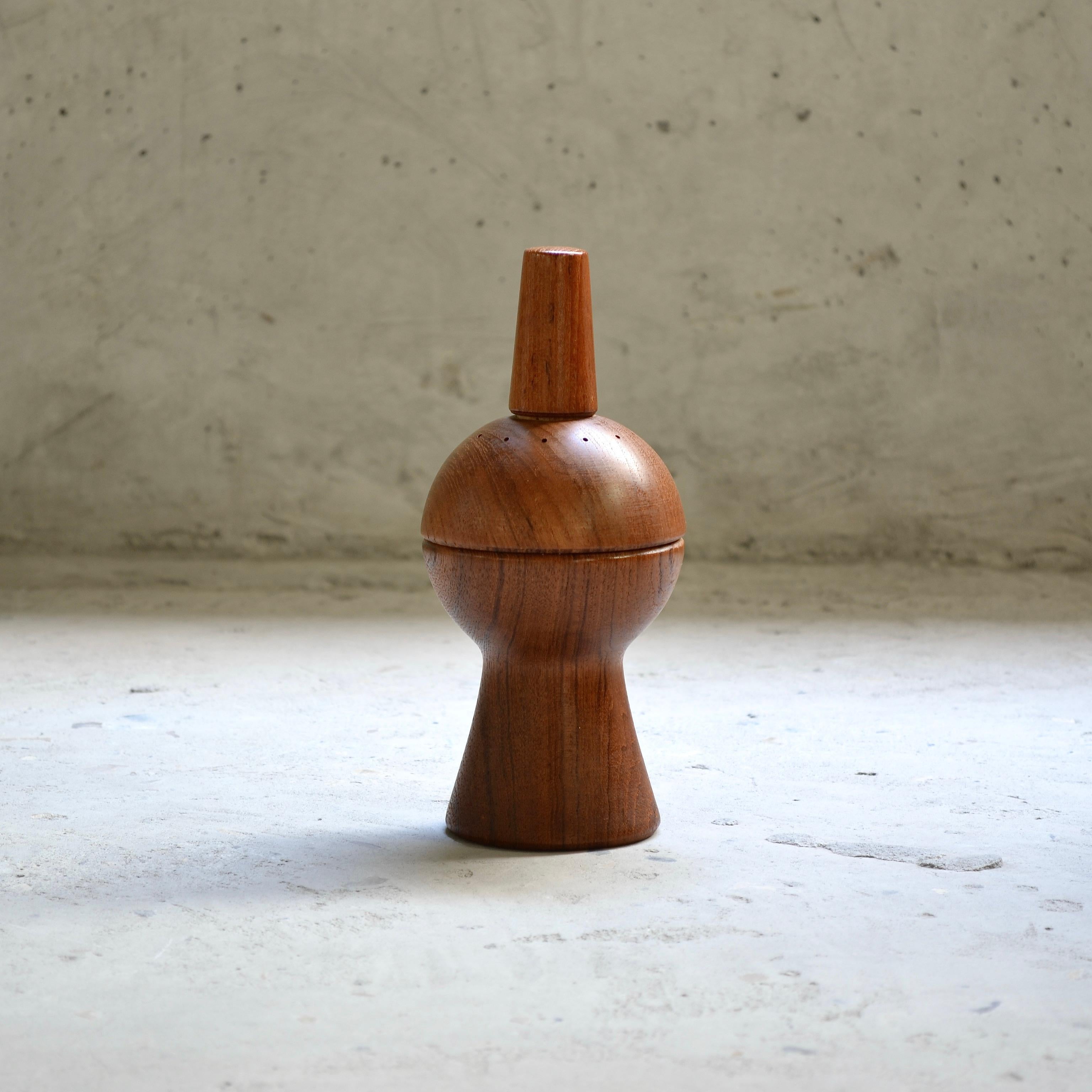 The salt and pepper sphere !

Jens H. Quistgaard's intriguing integrated salt and pepper shaker is a beautiful, precision-crafted little teak sculpture reminiscent of the glory days of the age of space conquest.

Like a little wooden UFO, let this