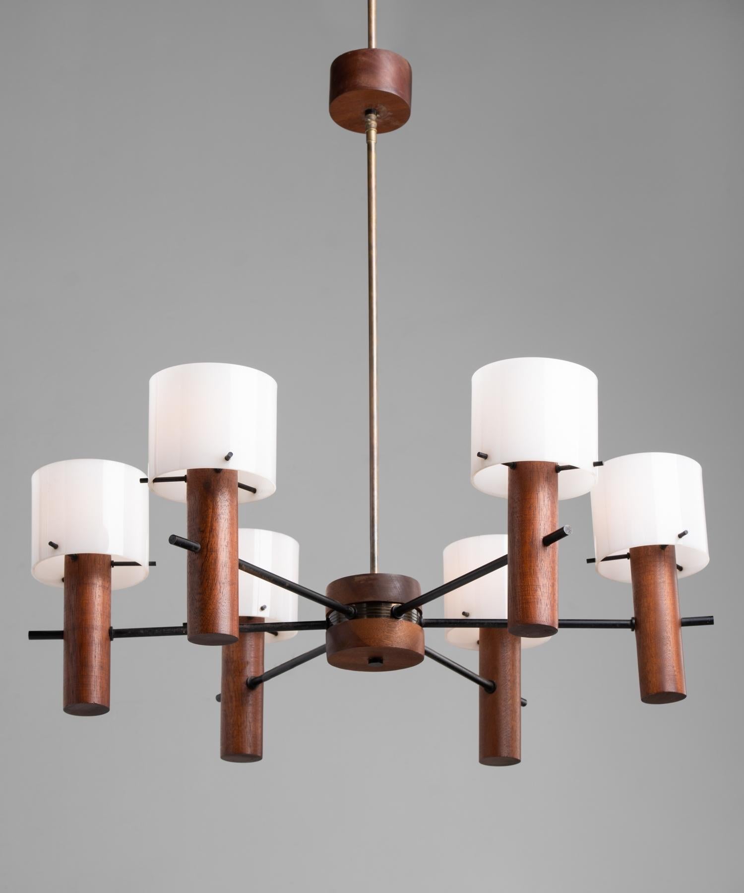 Teak & Perspex chandelier, Italy, circa 1960.

Elegant form with teak and metal construction and (6) cylindrical perspex shades.