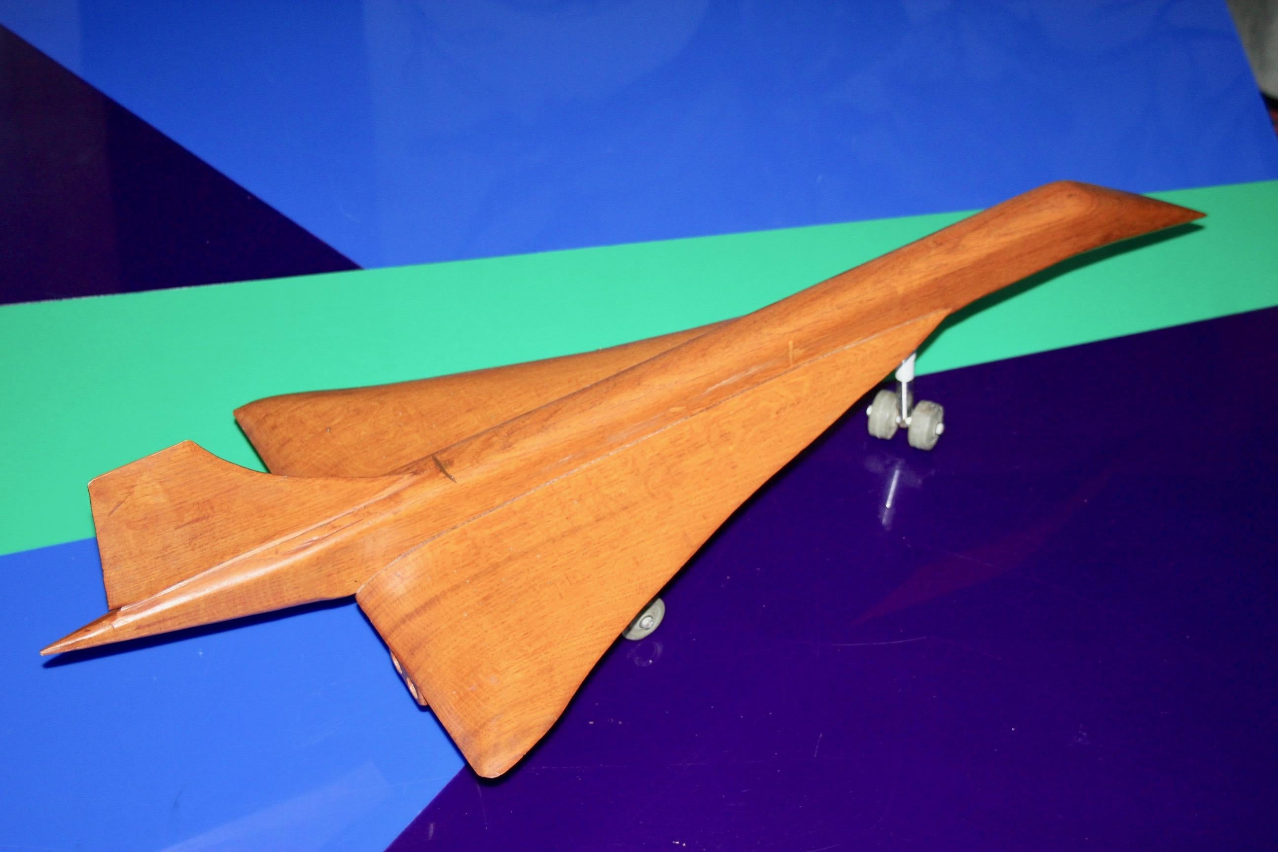 Late 20th Century teak plane representing the Concorde For Sale