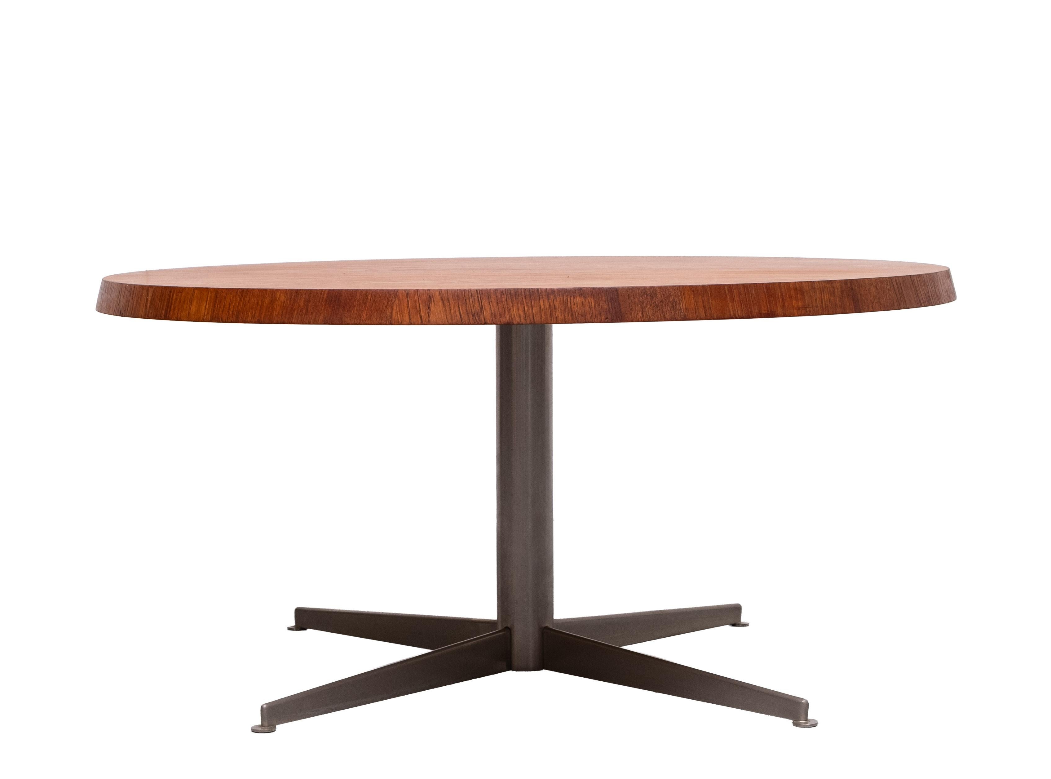 Very nice round Teak Coffee table . on a Chrome base .
Good condition . 1960s Germany 

  please ask for better chipping solutions 