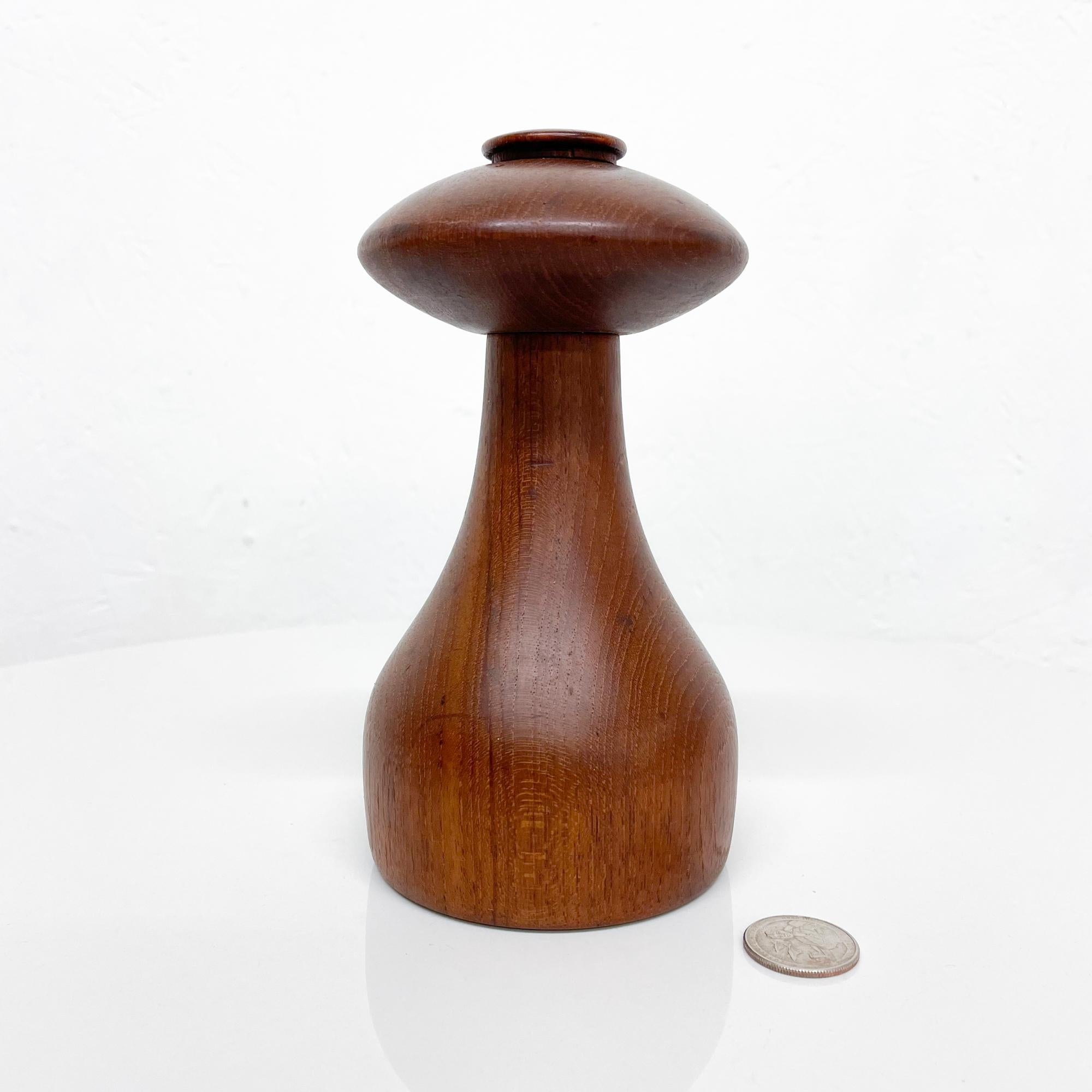For your consideration a vintage Danish modern teak pepper mill or shaker designed by Jens Quistgaard for Dansk. 
Made in Denmark, circa late 1960s.
Sculptural shape in very good vintage unrestored condition. Great color with beautiful vintage