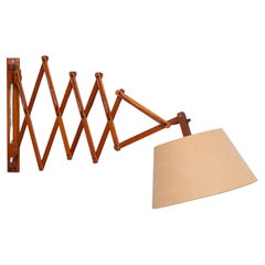Teak scissors wall lamp  1960s Holland
