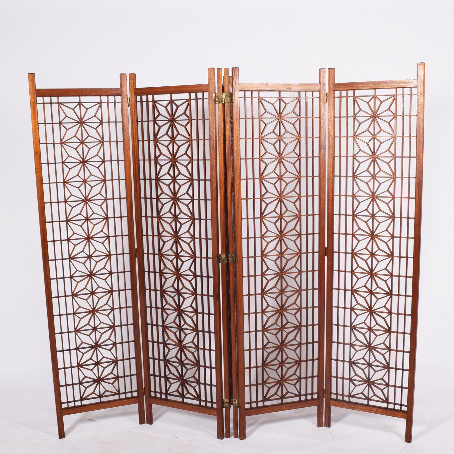 Six-panel screen or room divider made of solid teak with geometric designs.

Measures: Each panel: 75