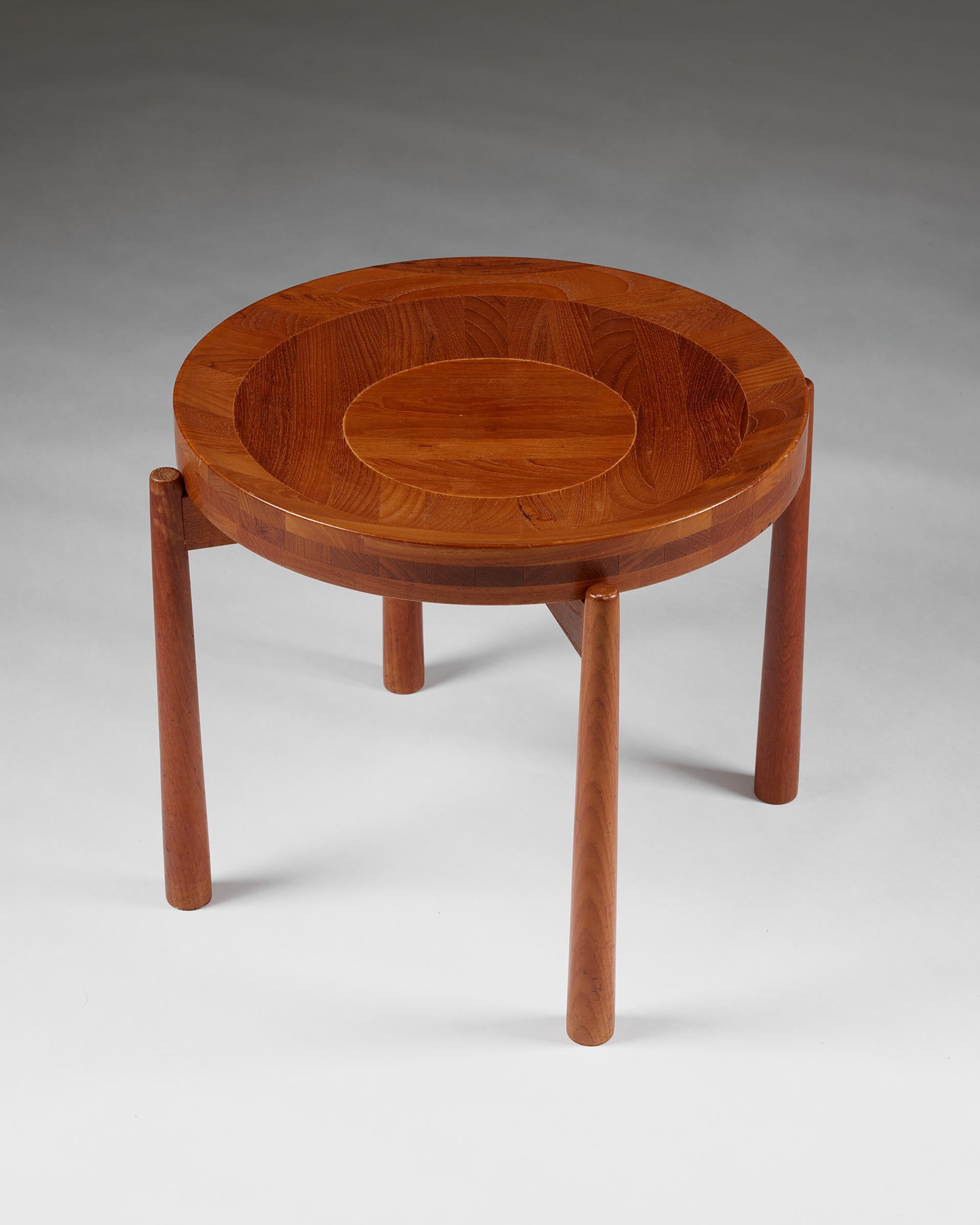 Danish Teak Side table designed by Jens Quistgaard, Denmark. 1950s, circular, wood For Sale