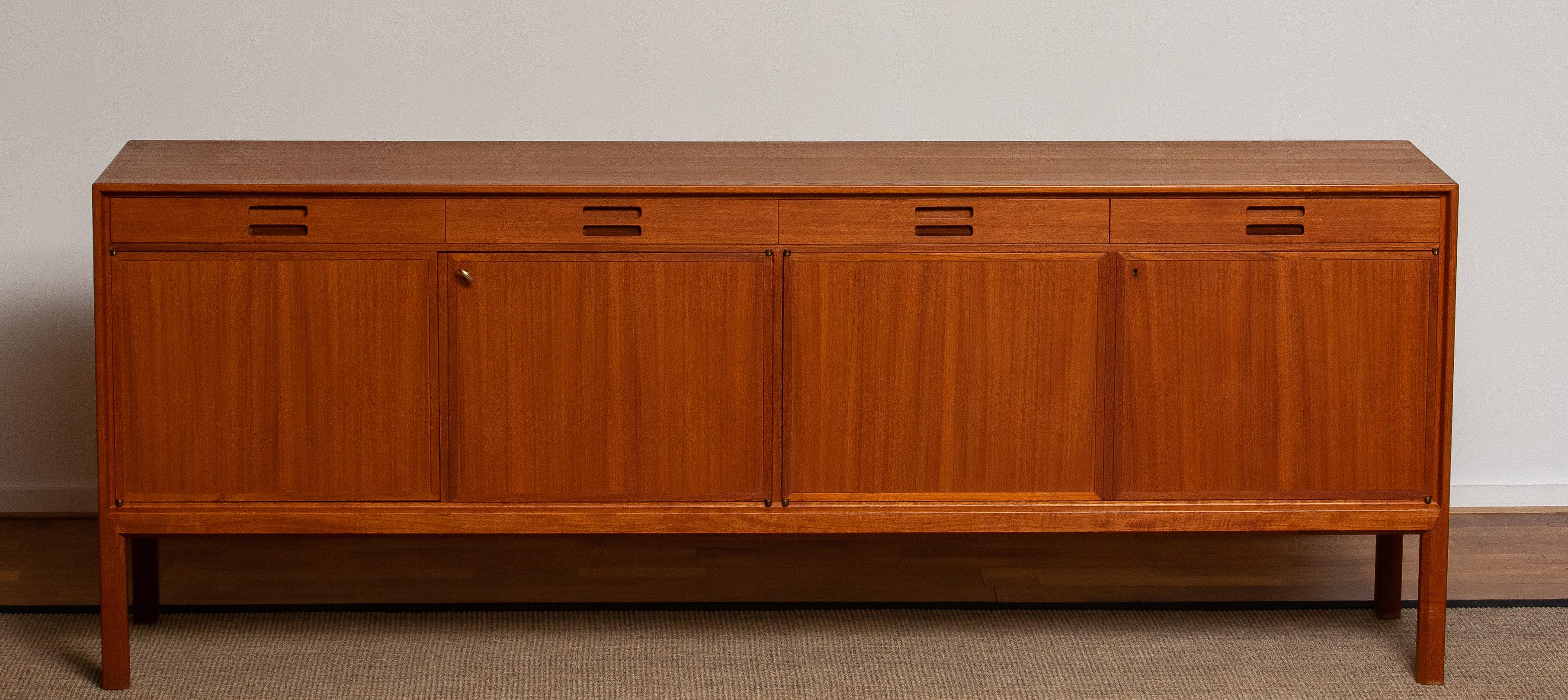 Teak sideboard designed by Bertil Fridhagen for Bodafors Bra Bohag from Sweden.
The sideboard is in an excellent condition. Period 1950s.
      
