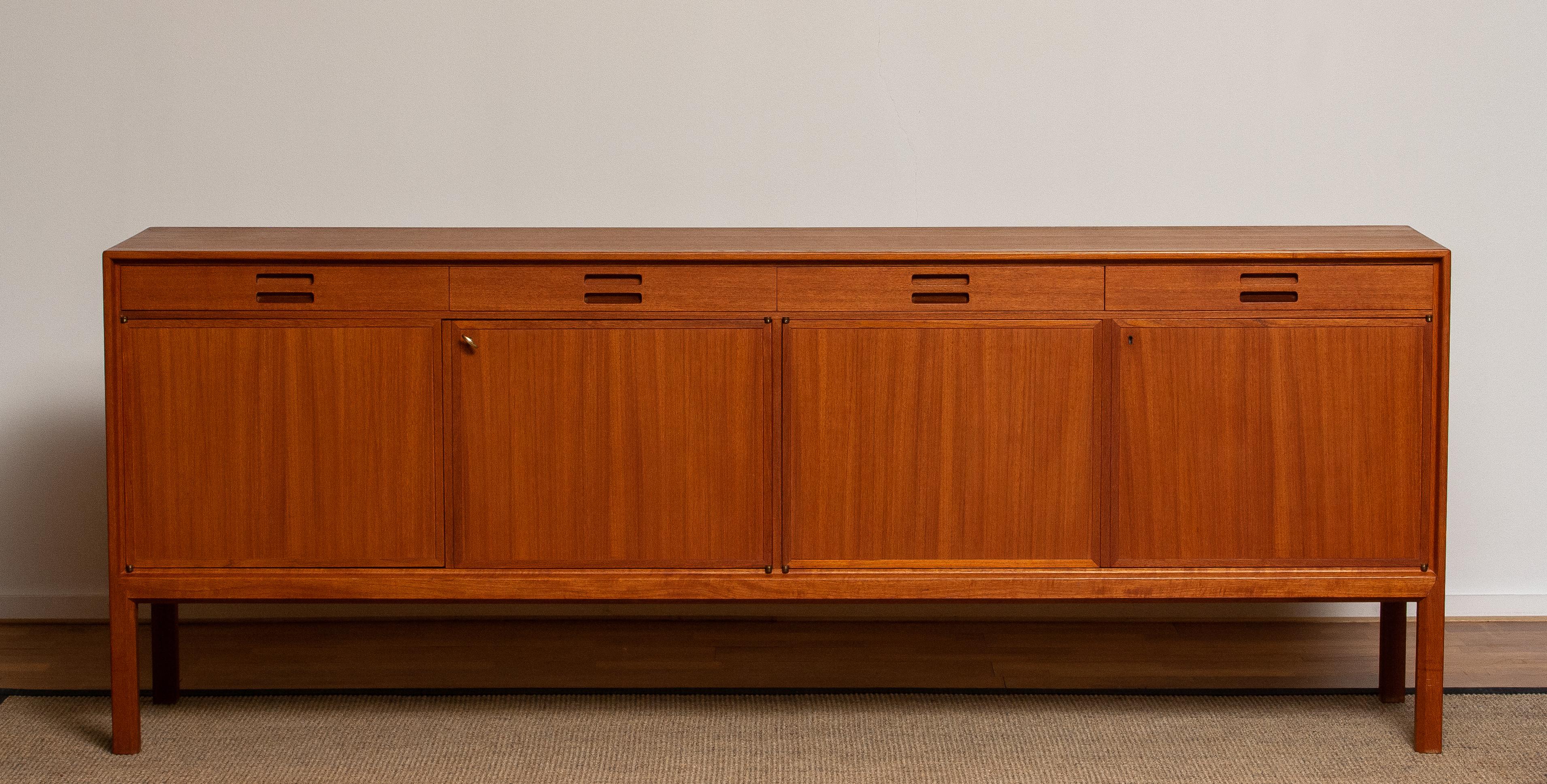 Teak sideboard designed by Bertil Fridhagen for Bodafors Bra Bohag from Sweden.
The sideboard is in an excellent condition. Period 1950s.
 