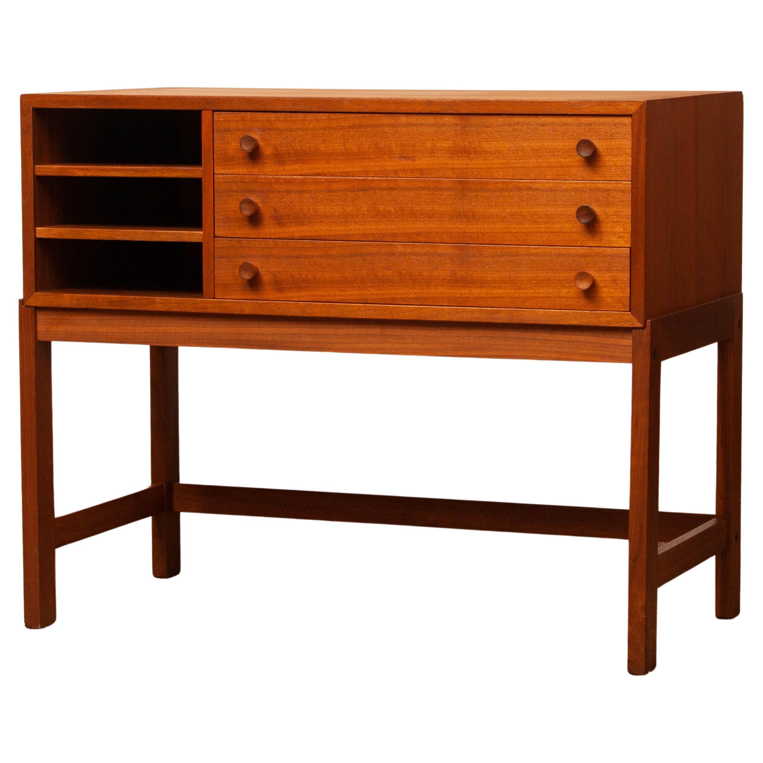 Very beautiful and high quality sideboard / credenzas in walnut and designed by Karl Erik Ekselius for JOC Design Vetlanda Sweden. This cabinet is in absolutely beautiful condition and in absolutely high craftsmen quality finished to all four